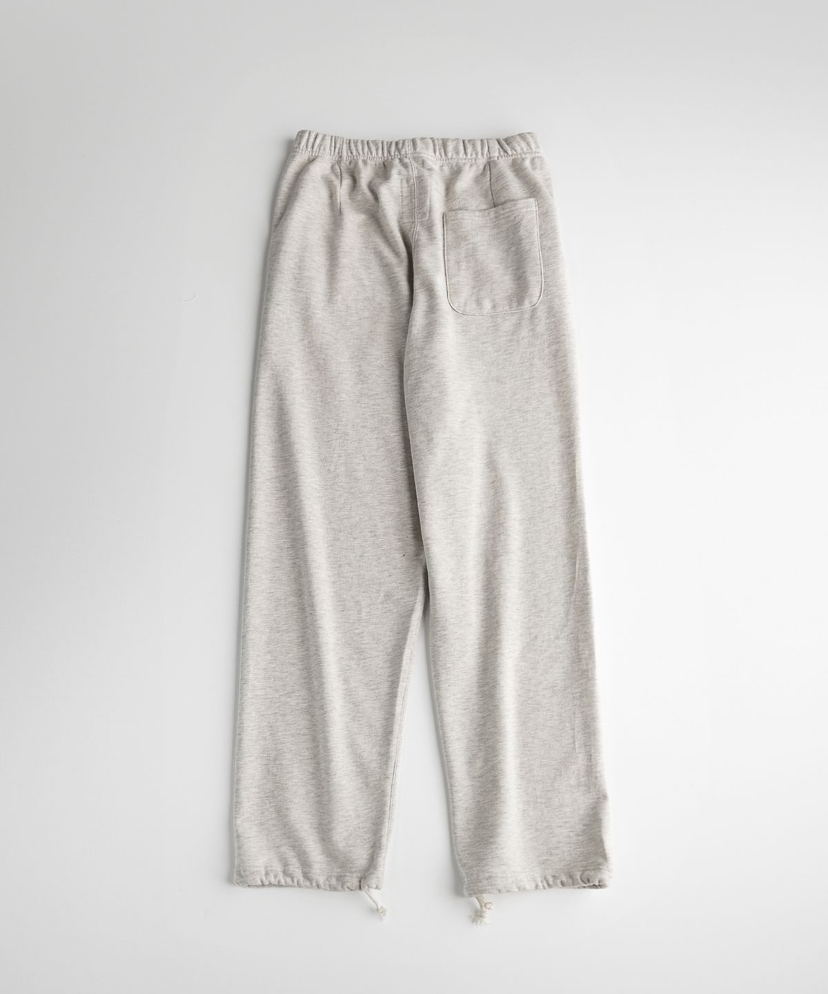 비헤비어(BEHEAVYER) ATHLETIC SEAMLESS SWEAT PANTS oatmeal melange