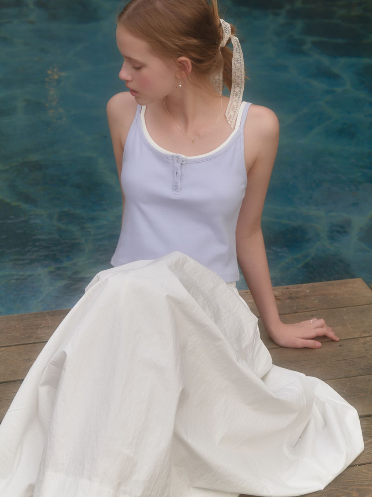 리엘(RE L) Soda button sleeveless (sky blue)