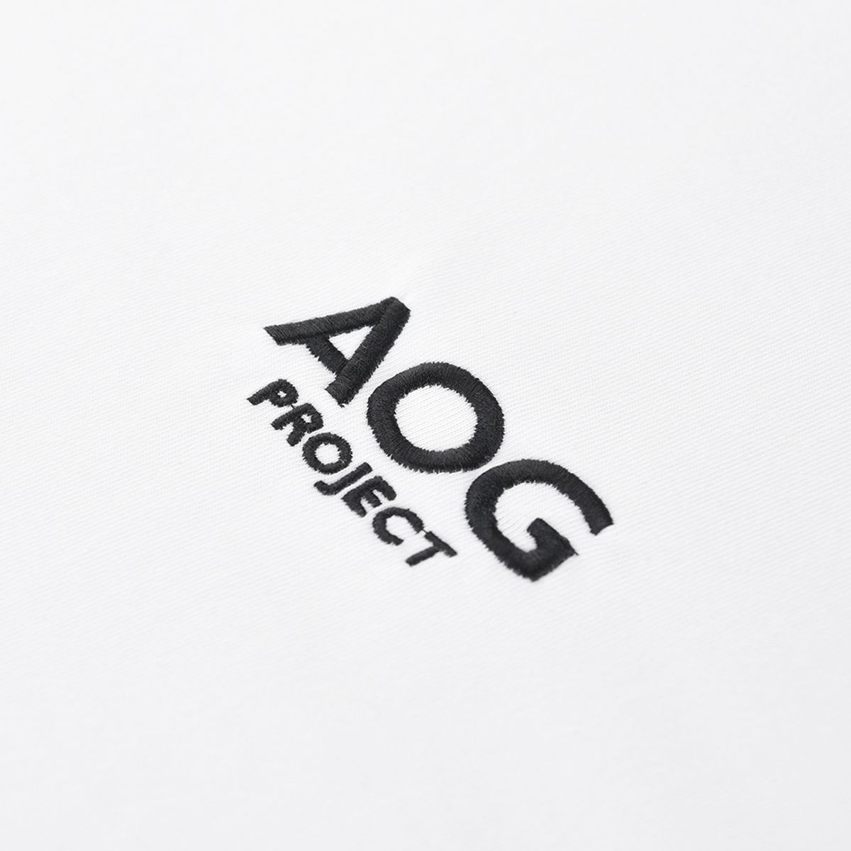 에이오지프로젝트(AOG PROJECT) 미라클 라이언 엠보더리 로고 티셔츠 (화이트)