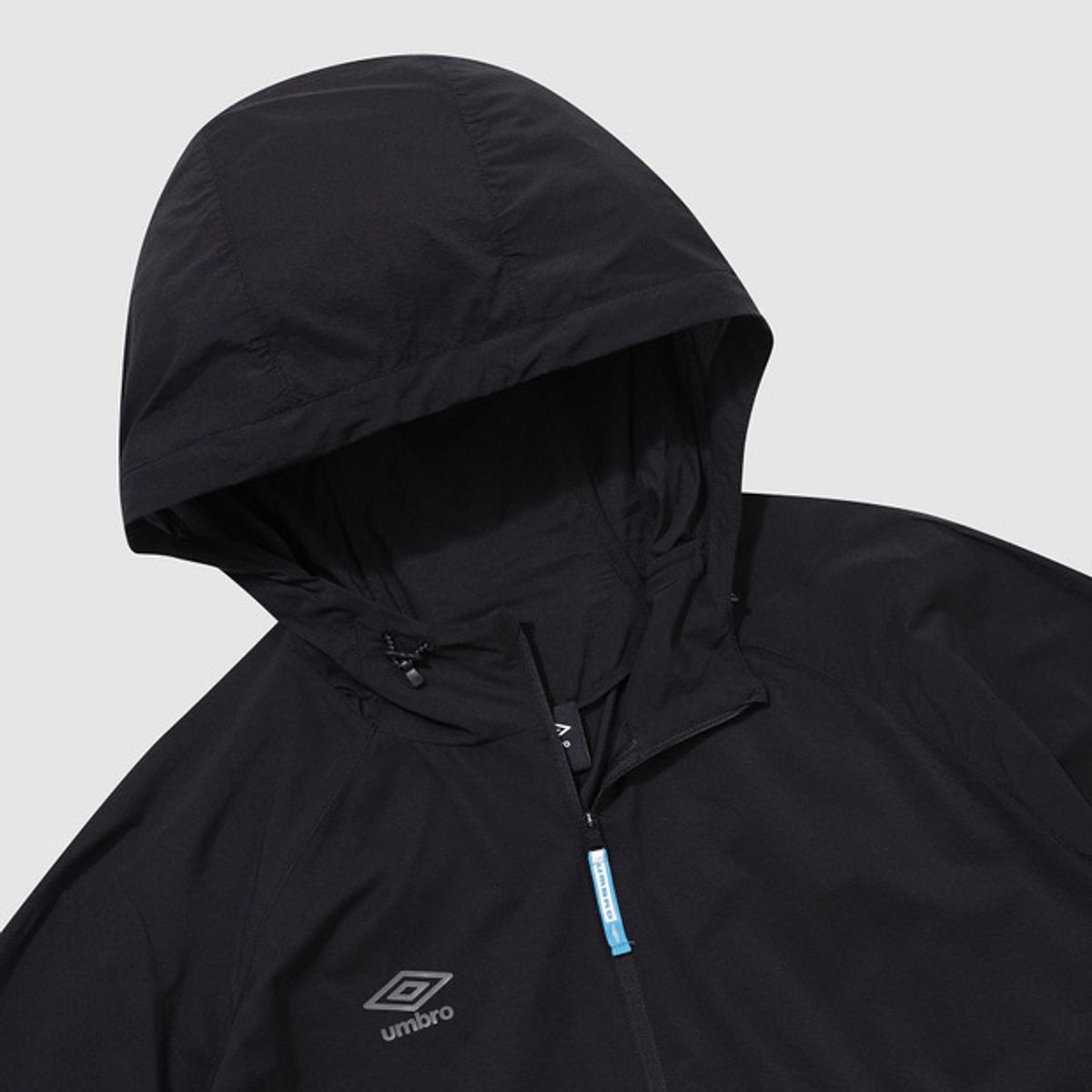 엄브로(UMBRO) [패커블] 셔틀런 초경량 후드형 바람막이 집업 자켓 블랙(UQ221SJK51)