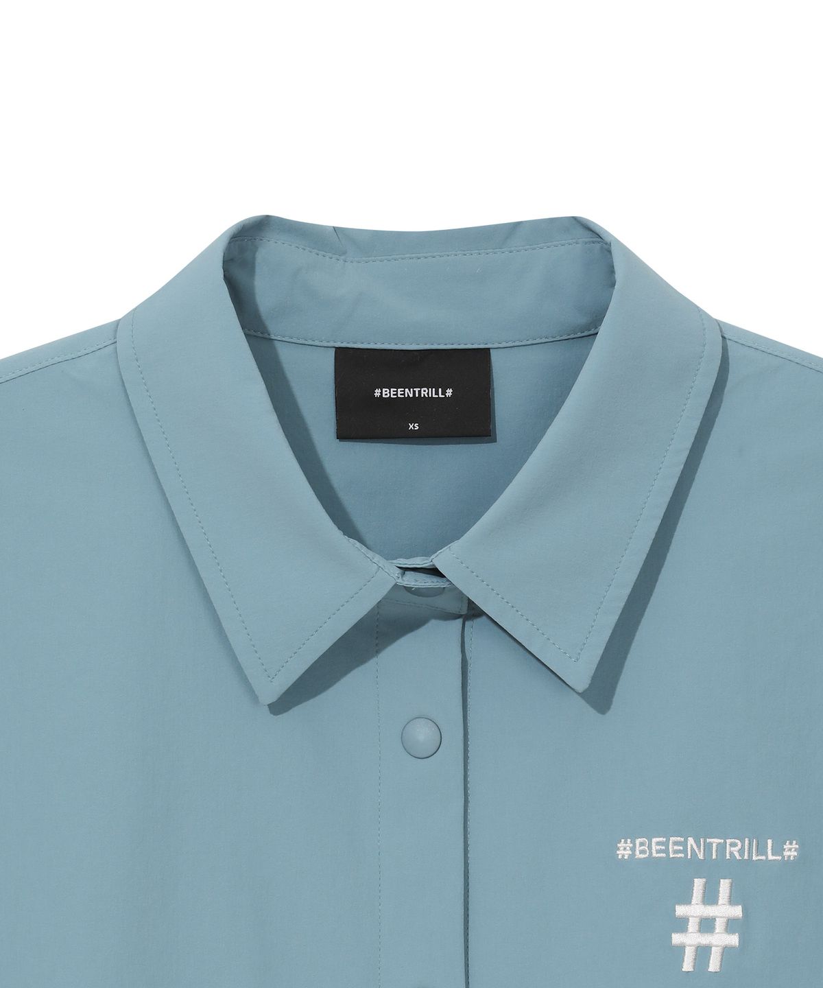 빈트릴 뉴욕(BEENTRILL NEWYORK) 우먼즈 우븐 테크 크롭 셔츠(블루)