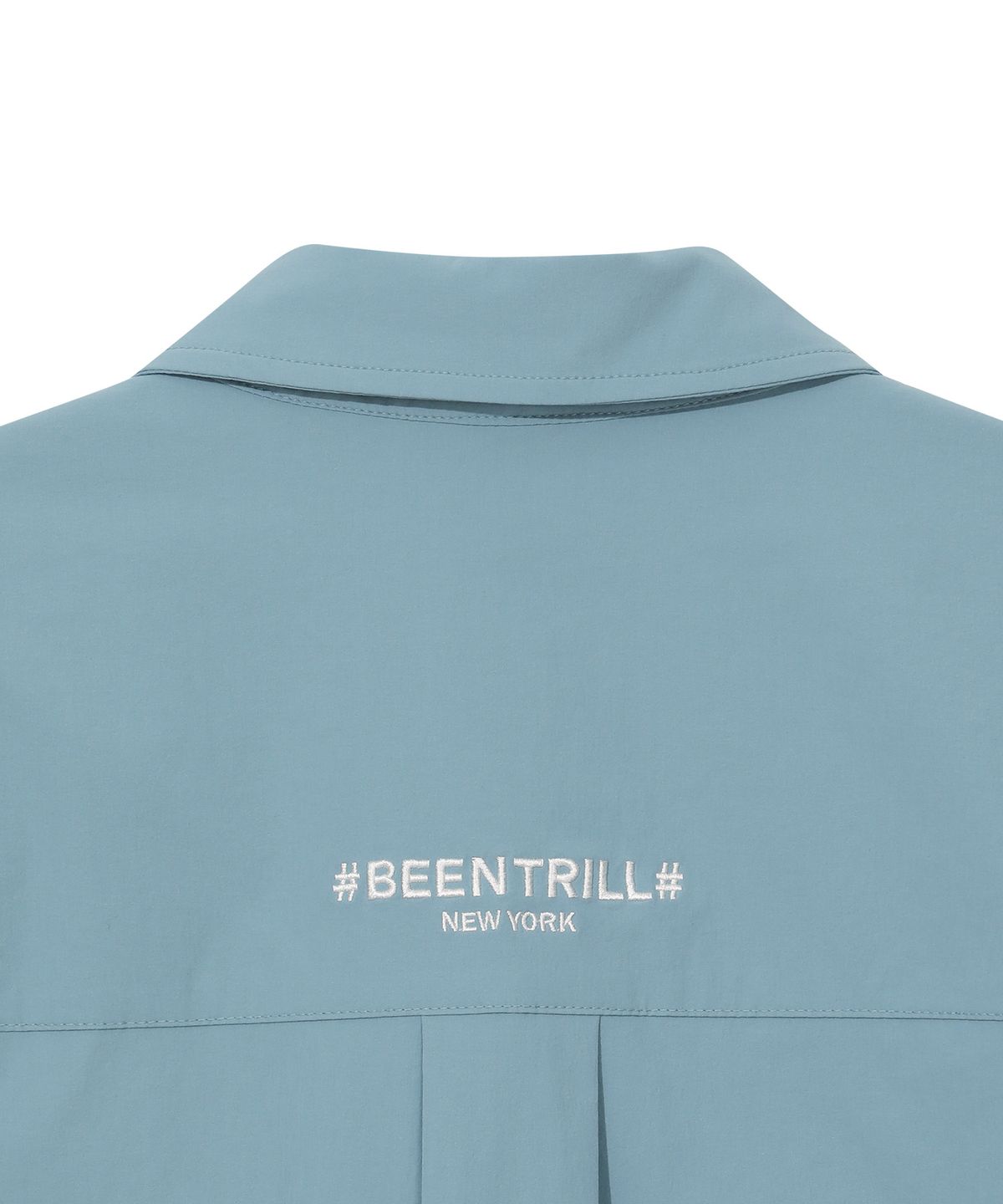 빈트릴 뉴욕(BEENTRILL NEWYORK) 우먼즈 우븐 테크 크롭 셔츠(블루)