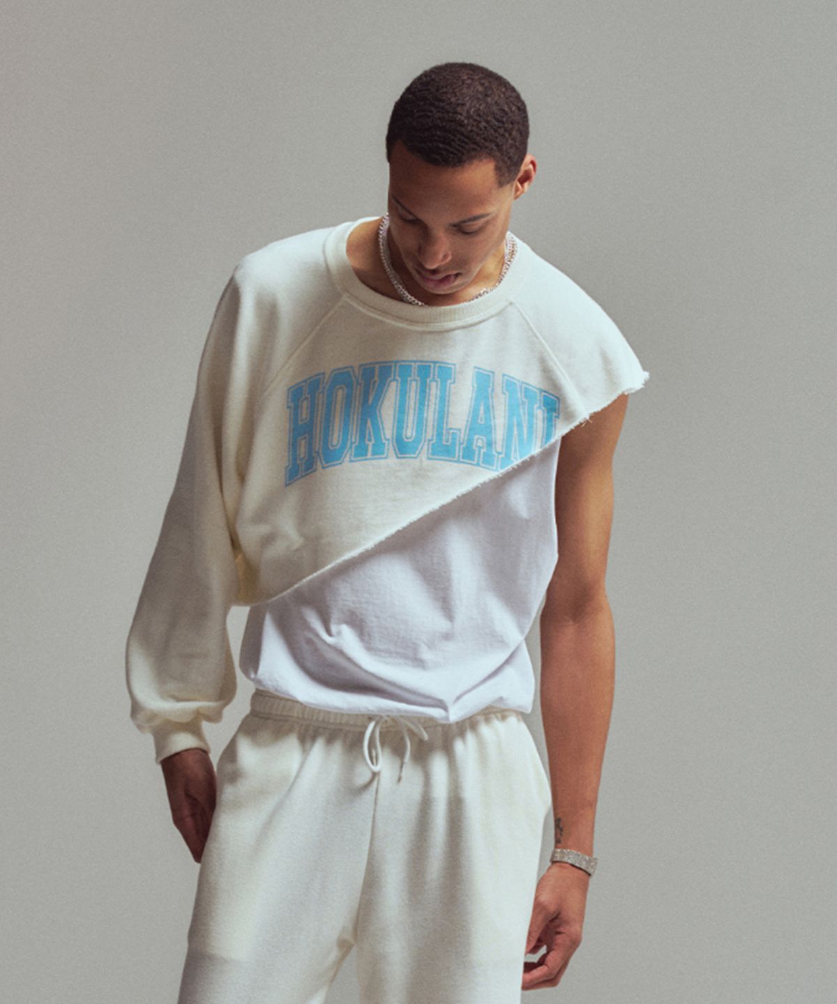 에르에르(ERER) [UN] Hokulani diagonal sweatshirt Ivory
