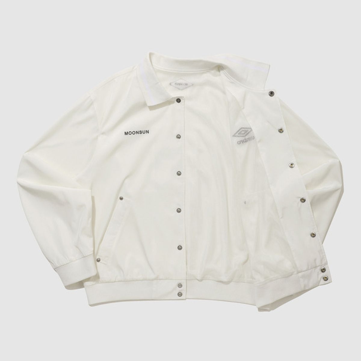 엄브로(UMBRO) [UMBRO X MOONSUN] 경량 앤썸 자켓 아이보리(UQ223CJK41)