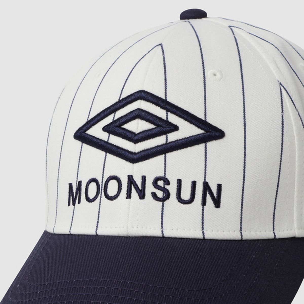 엄브로(UMBRO) [UMBRO X MOONSUN] 베이스볼캡 네이비(UQ223CCP40)