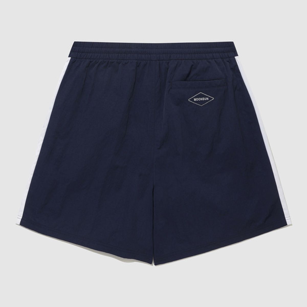 엄브로(UMBRO) [UMBRO X MOONSUN] 4부 우븐 쇼츠 네이비(UQ223CHP45)