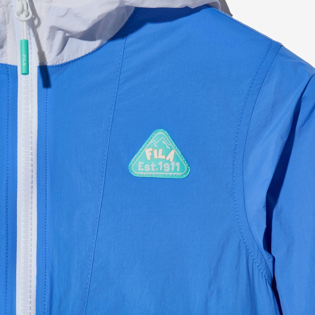 휠라 키즈(FILA KIDS) Travel club 컬러블럭 바람막이(FK2JKH2403XAZU)