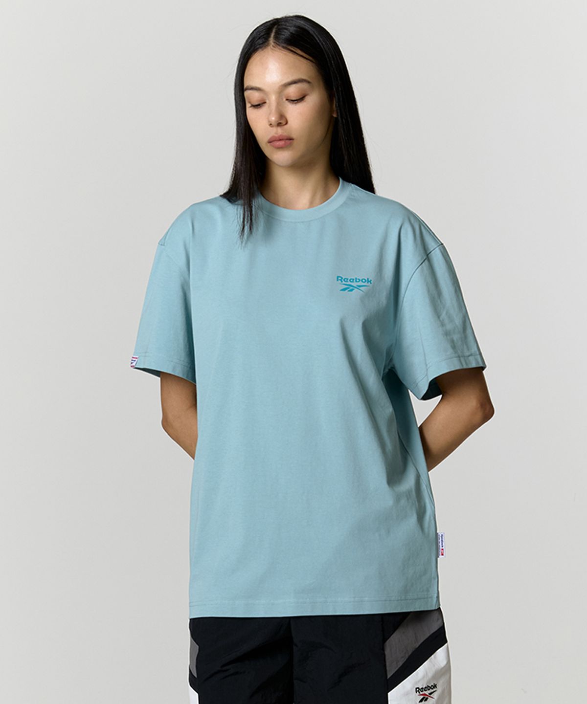 리복(REEBOK) 아이스코튼 그래픽 티셔츠 - 스카이