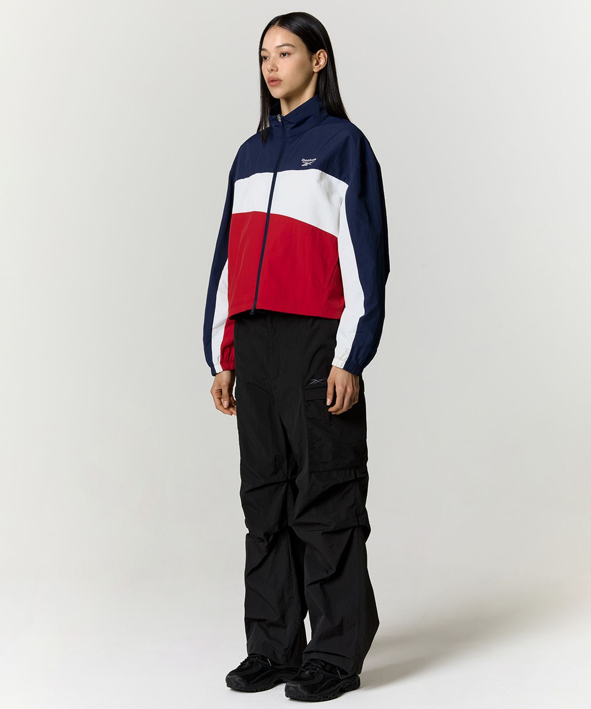 리복(REEBOK) DNA 크롭 윈드 브레이커 (W) - 네이비:레드