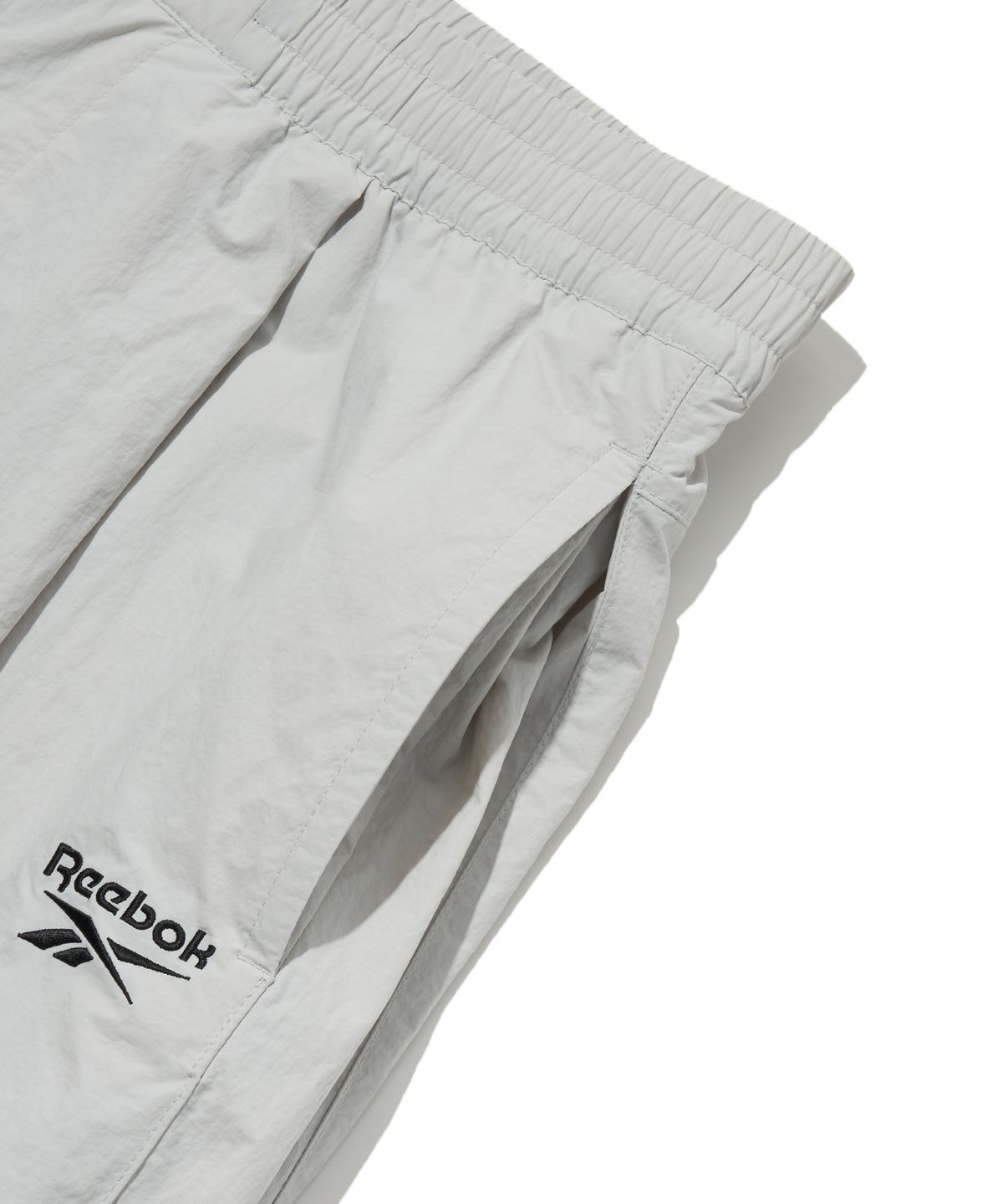 리복(REEBOK) 와이드 파라슈트 팬츠 - 라이트 그레이