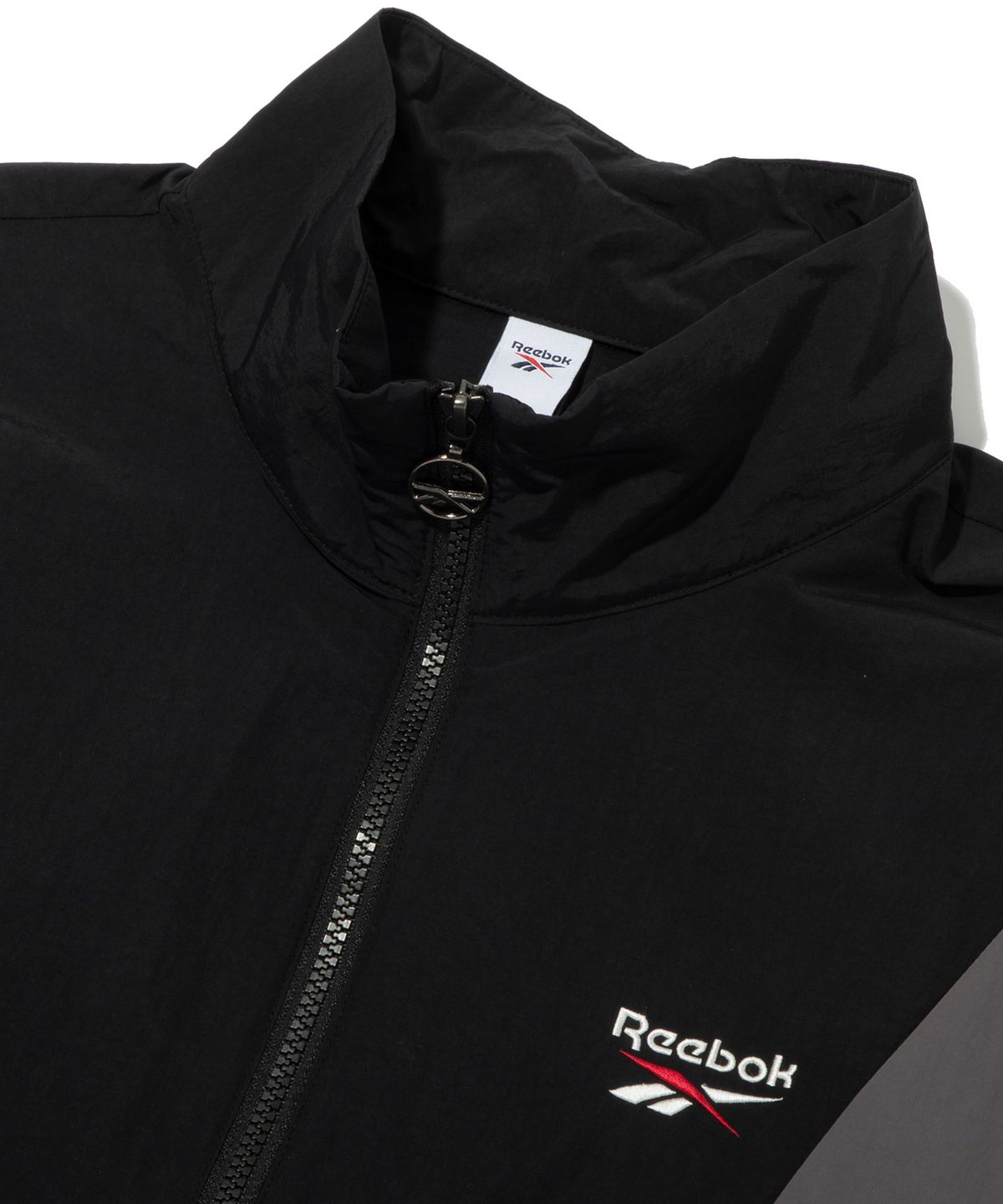 리복(REEBOK) DNA 반팔 아노락 - 블랙
