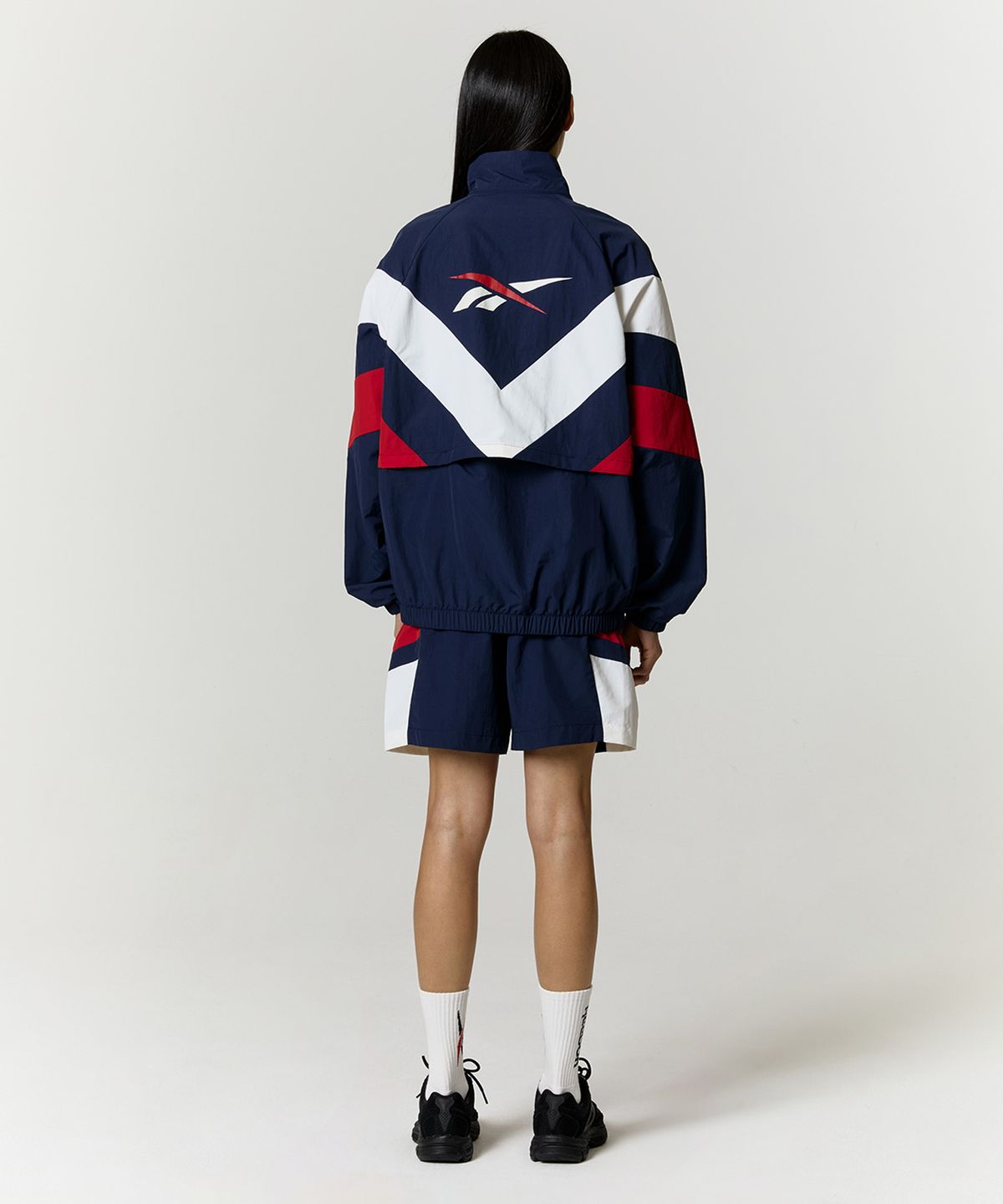 리복(REEBOK) DNA 윈드 브레이커 - 네이비