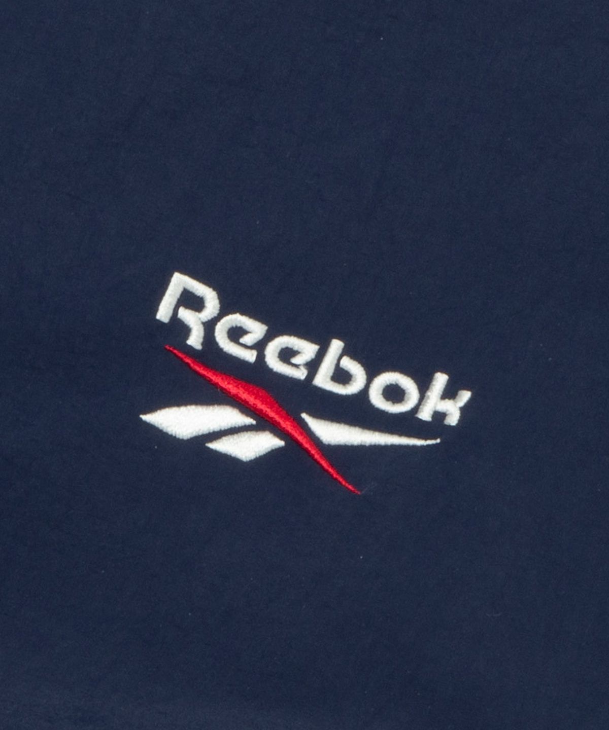 리복(REEBOK) DNA 윈드 브레이커 - 네이비