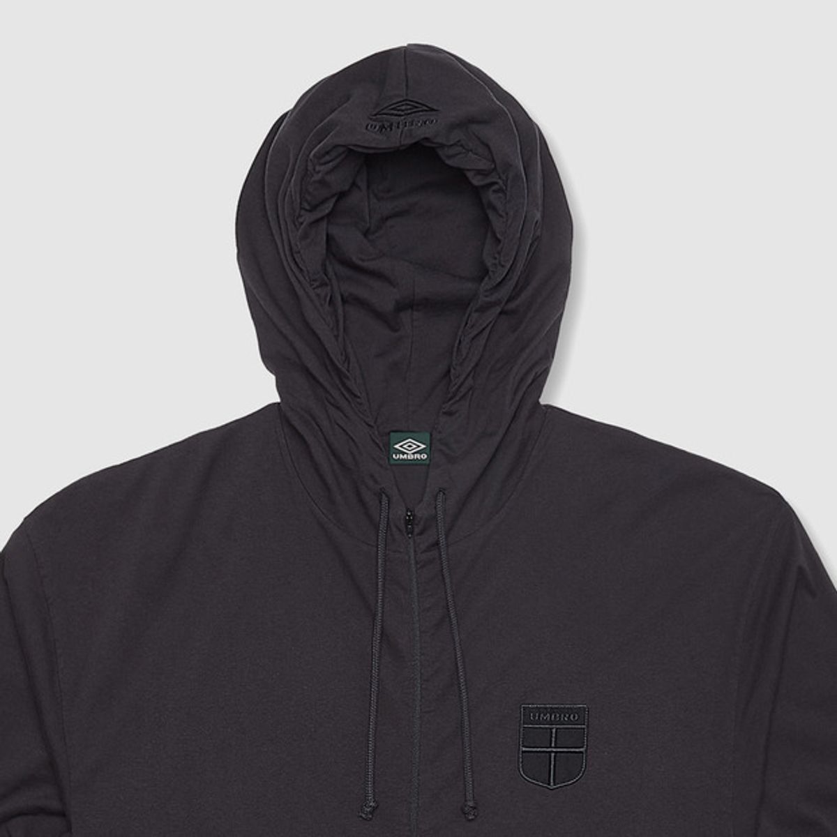 엄브로(UMBRO) [UMBRO X SLAM JAM] Crest Jersey 후드 자켓 블랙(UQ111CFT38)