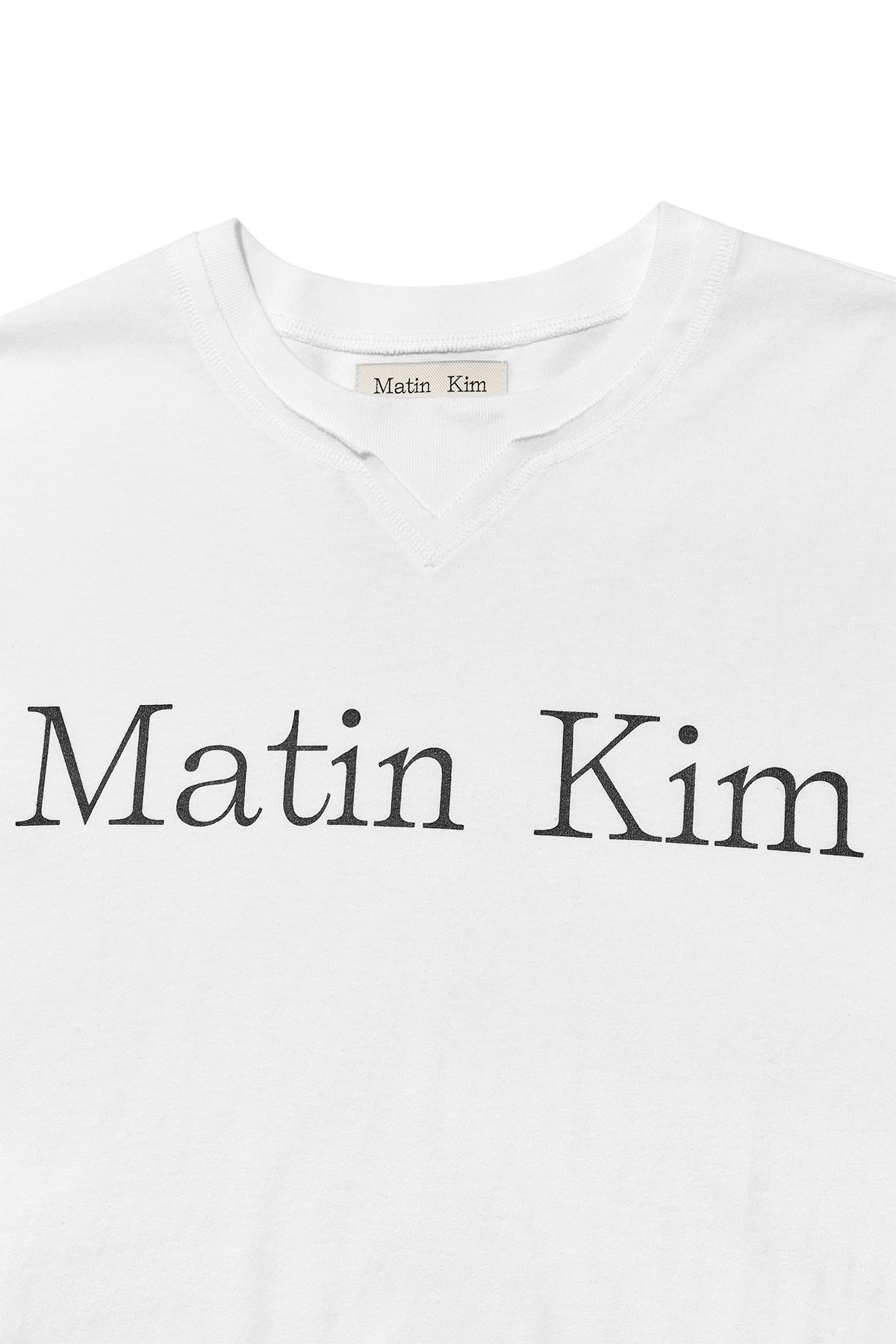MUSINSA | MATIN KIM MATIN LOGO TYPO LONG SLEEVE TOP IN WHITE
