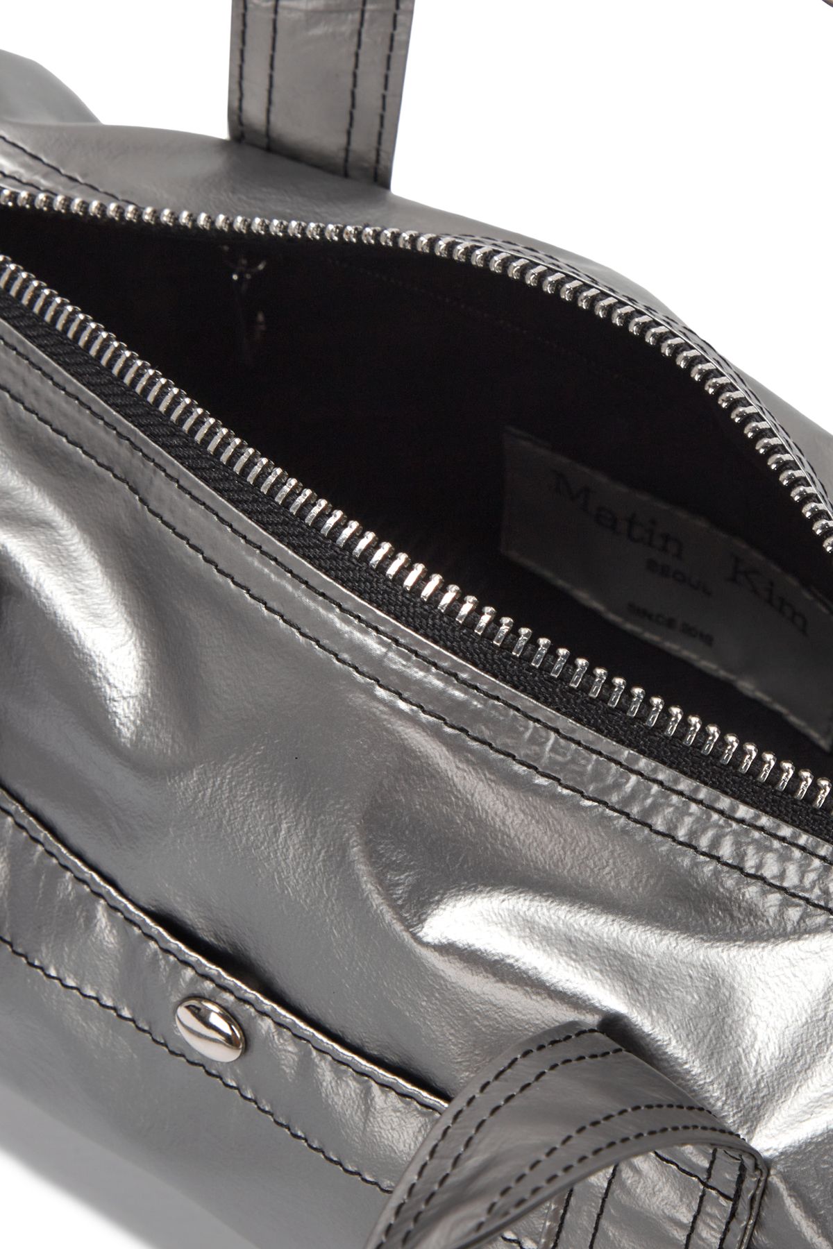 MUSINSA | MATIN KIM GLOSSY LOGO SPORTY MINI DUFFEL BAG IN SILVER