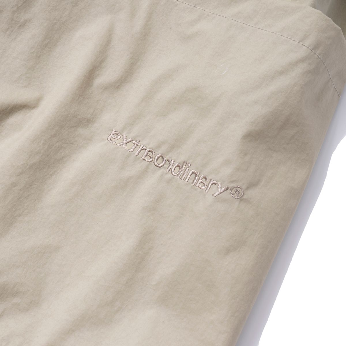 엑스트라오디너리(EXTRAORDINARY) LAYERED POCKET SHORTS BEIGE