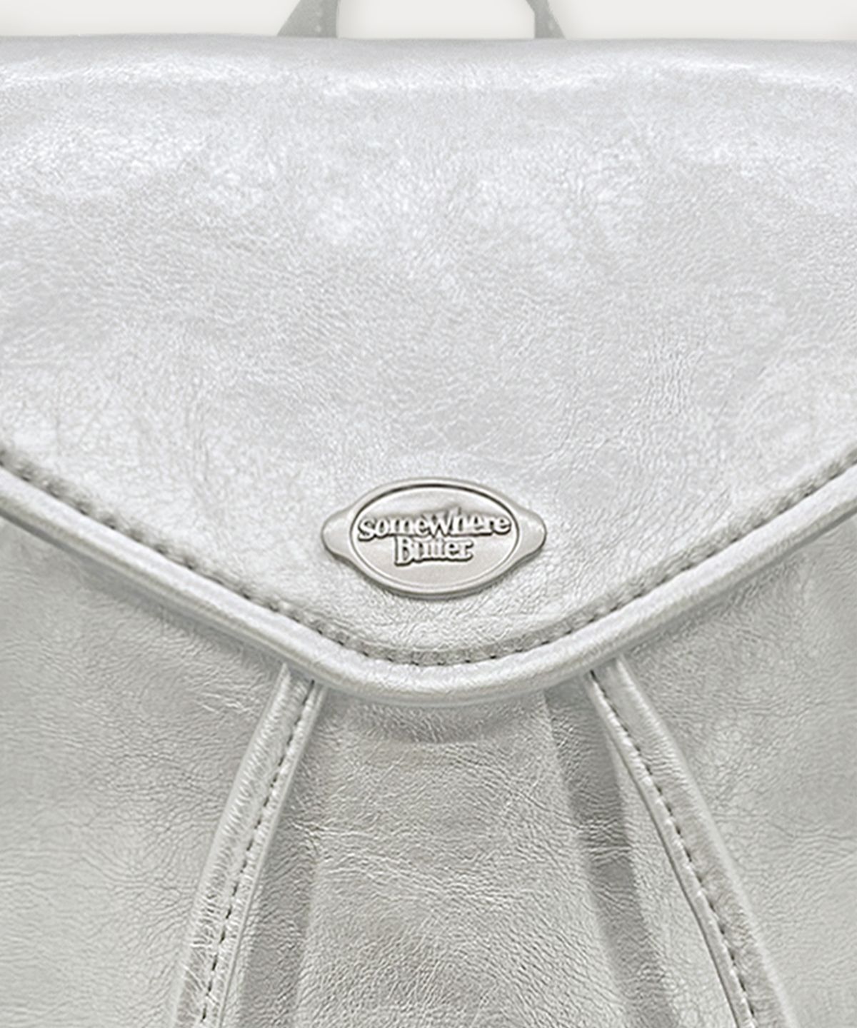 썸웨어버터(SOMEWHEREBUTTER) Mini Fle Backpack - Silver