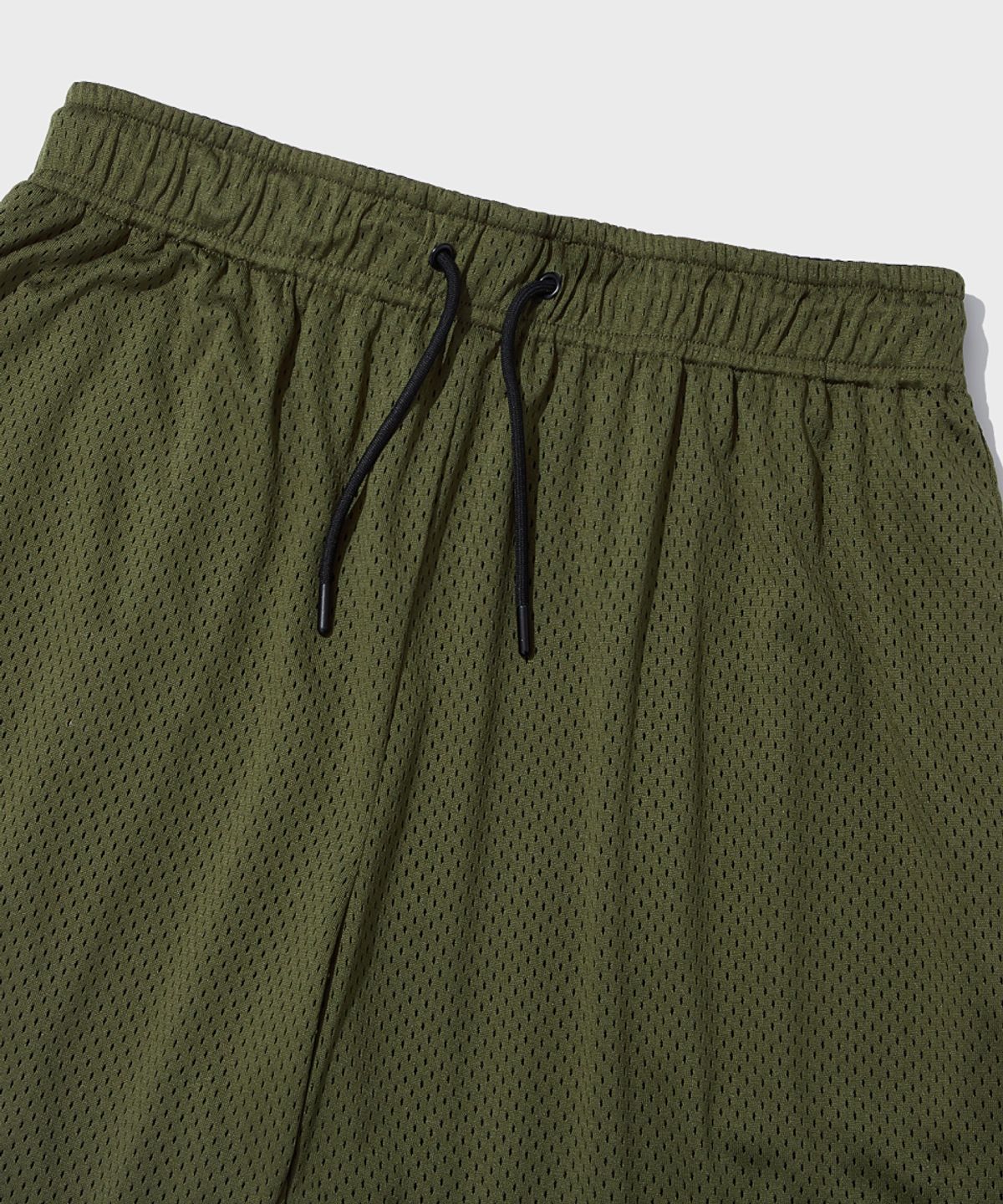 아웃스탠딩(OUTSTANDING) REVERSIBLE MESH SHORTS_BLACK/OLIVE