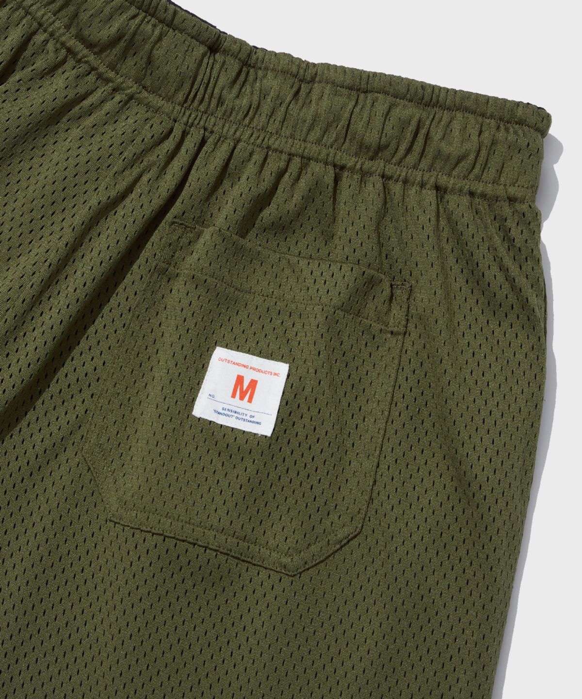 아웃스탠딩(OUTSTANDING) REVERSIBLE MESH SHORTS_BLACK/OLIVE