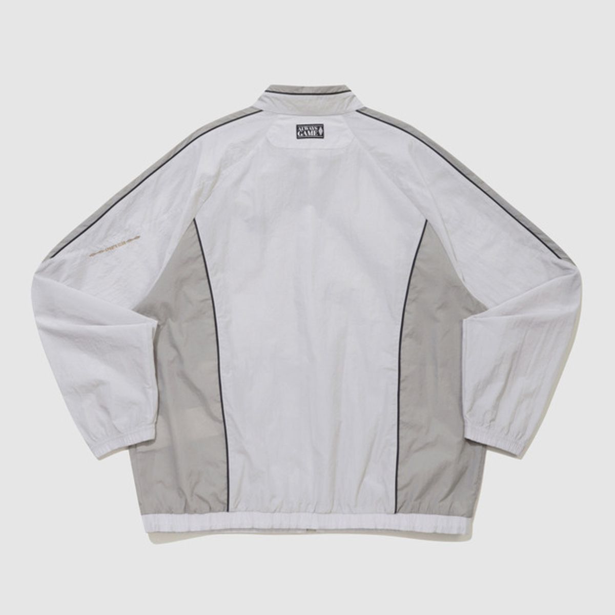 엄브로(UMBRO) HBL BLOKE OG 트랙 우븐 바람막이 자켓 라이트 그레이(UQ221CJK52)