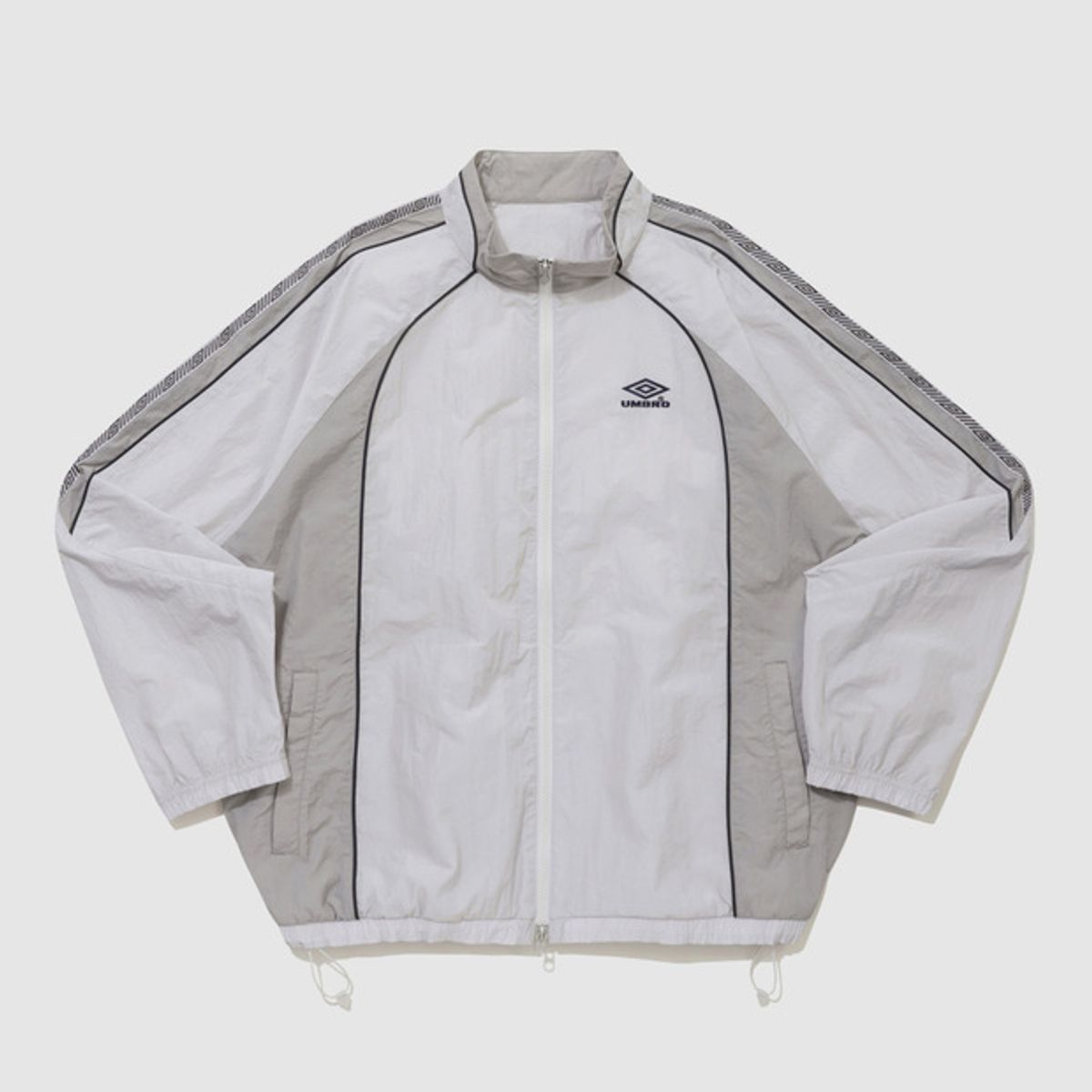엄브로(UMBRO) HBL BLOKE OG 트랙 우븐 바람막이 자켓 라이트 그레이(UQ221CJK52)