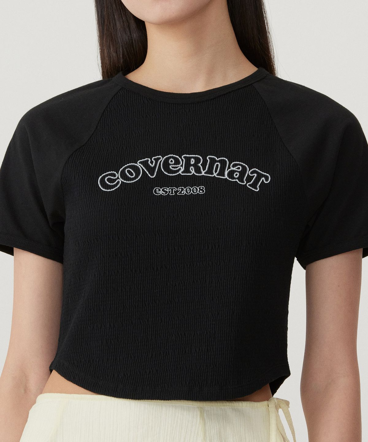 커버낫 우먼(COVERNAT WOMAN) 우먼 베이비핏 아치 쿠퍼로고 셔링 티셔츠 Black
