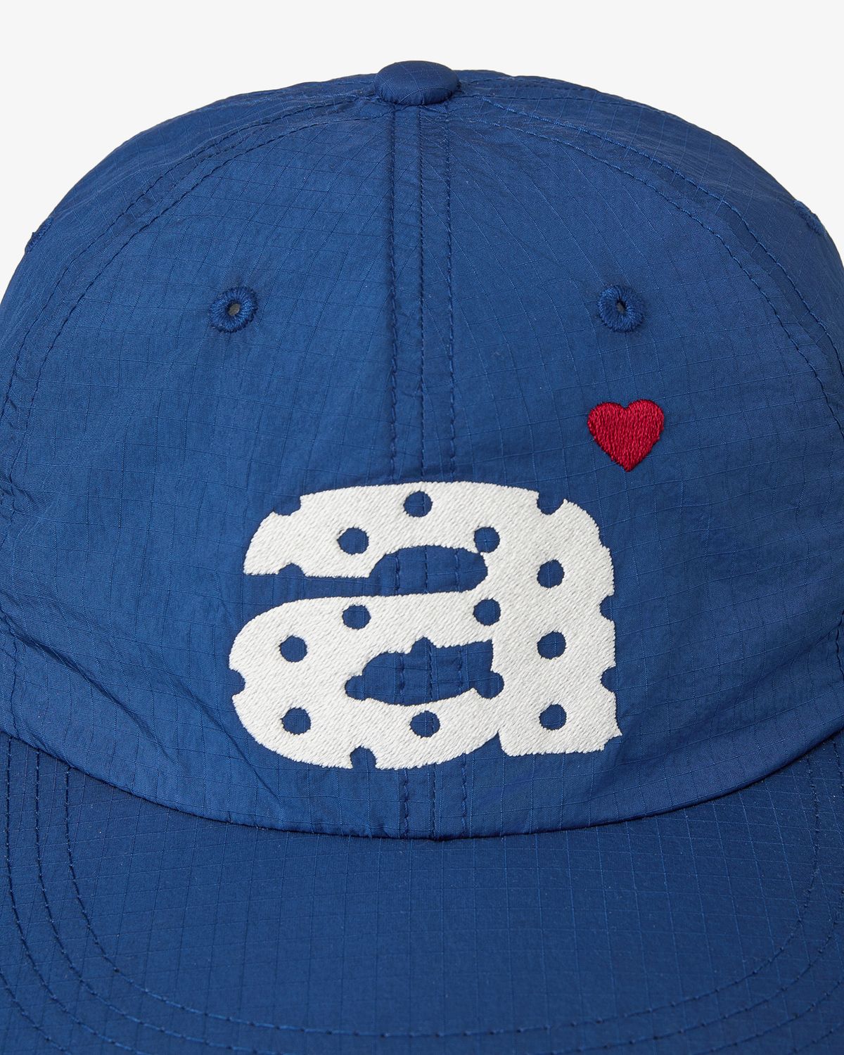 에이이에이이(AEAE) DOT SMALL LETTER NYLON CAP [BLUE]