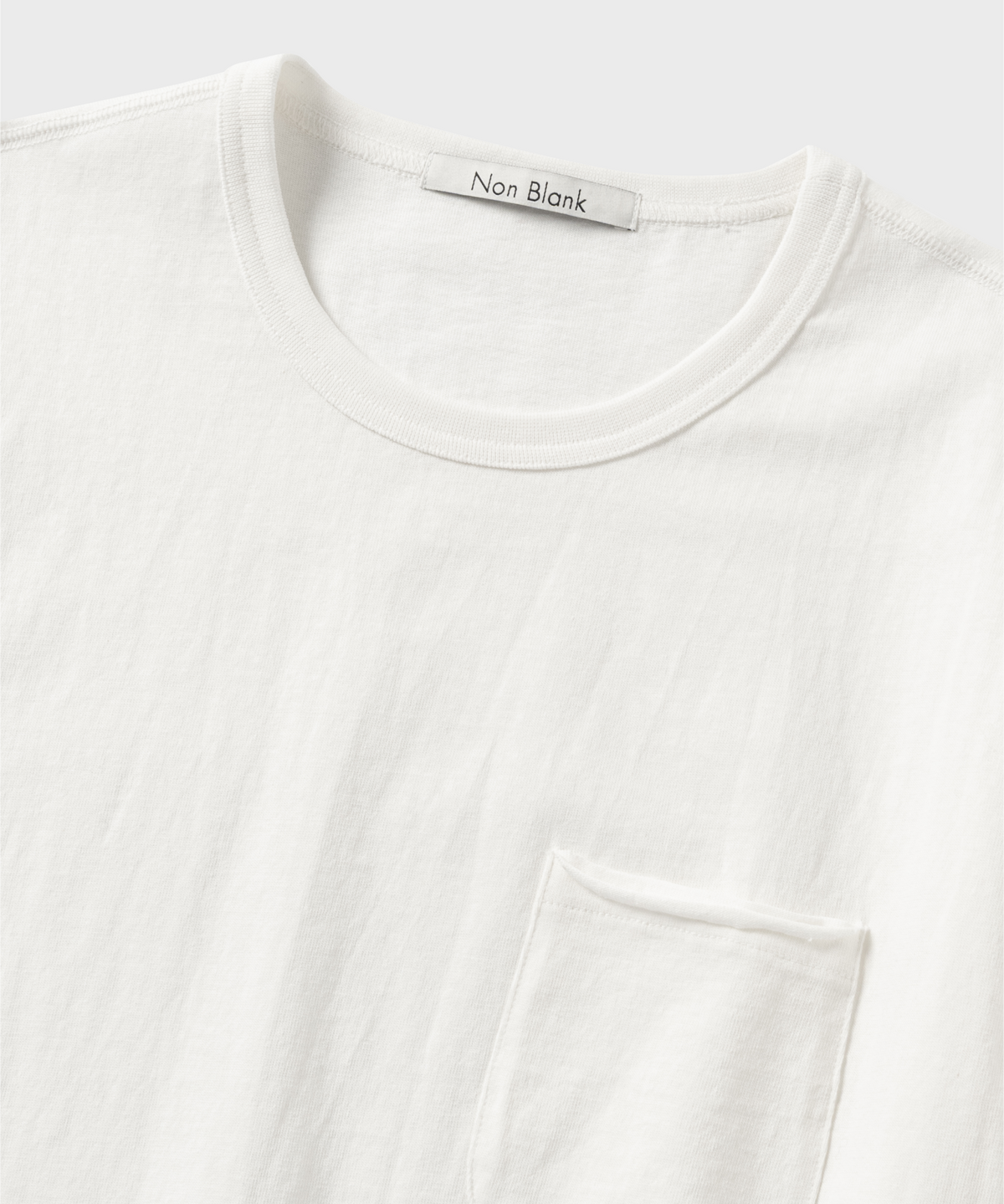 넌블랭크(NONBLANK) 포켓 티셔츠_WHITE