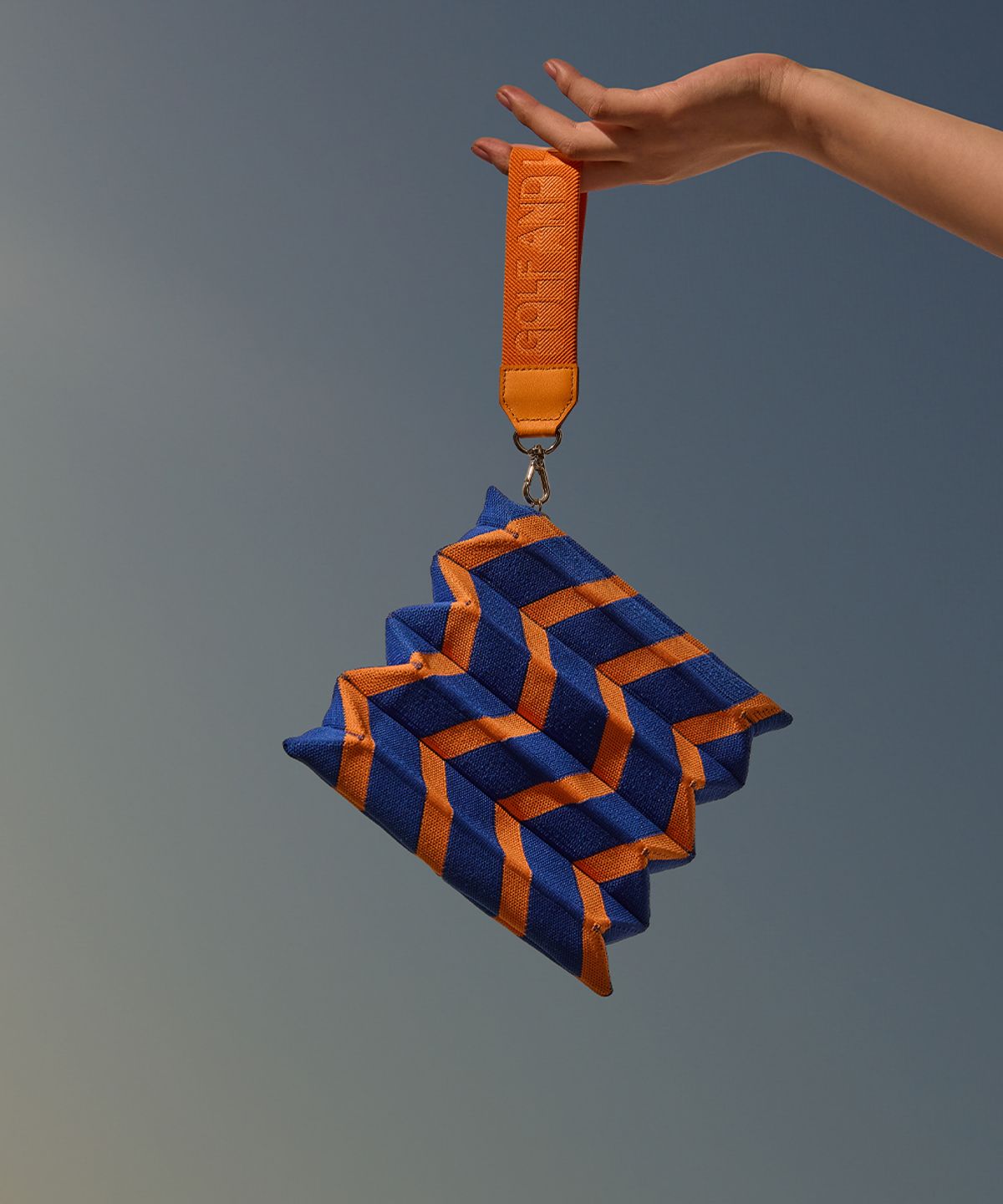 앤드 골프(AND GOLF) Handy Pleats Pouch Zigzag Orange