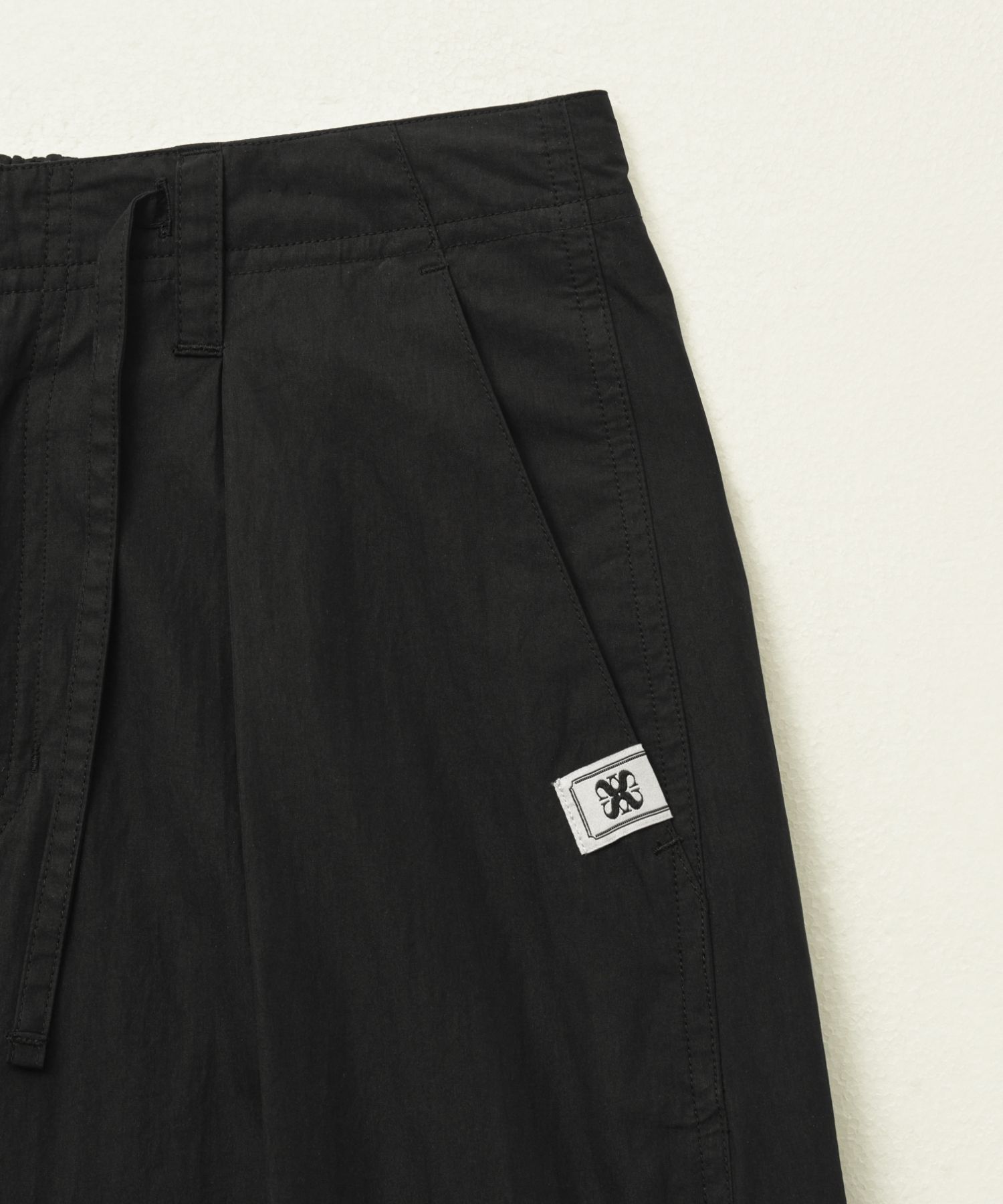 【SATUR】 Curved Parachute Pants / 追跡付 MUSINSA | SATUR Curved parachute pants black