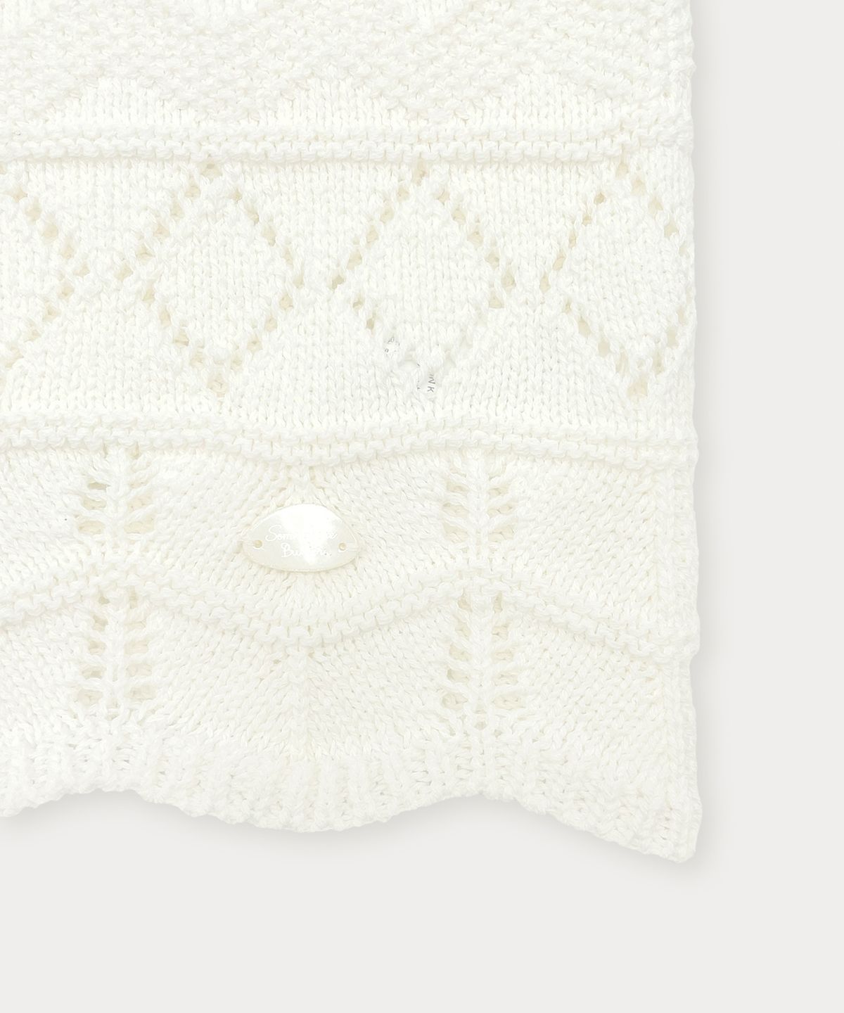 썸웨어버터(SOMEWHEREBUTTER) Plot Skashi Sleeveless Knit - Ivory