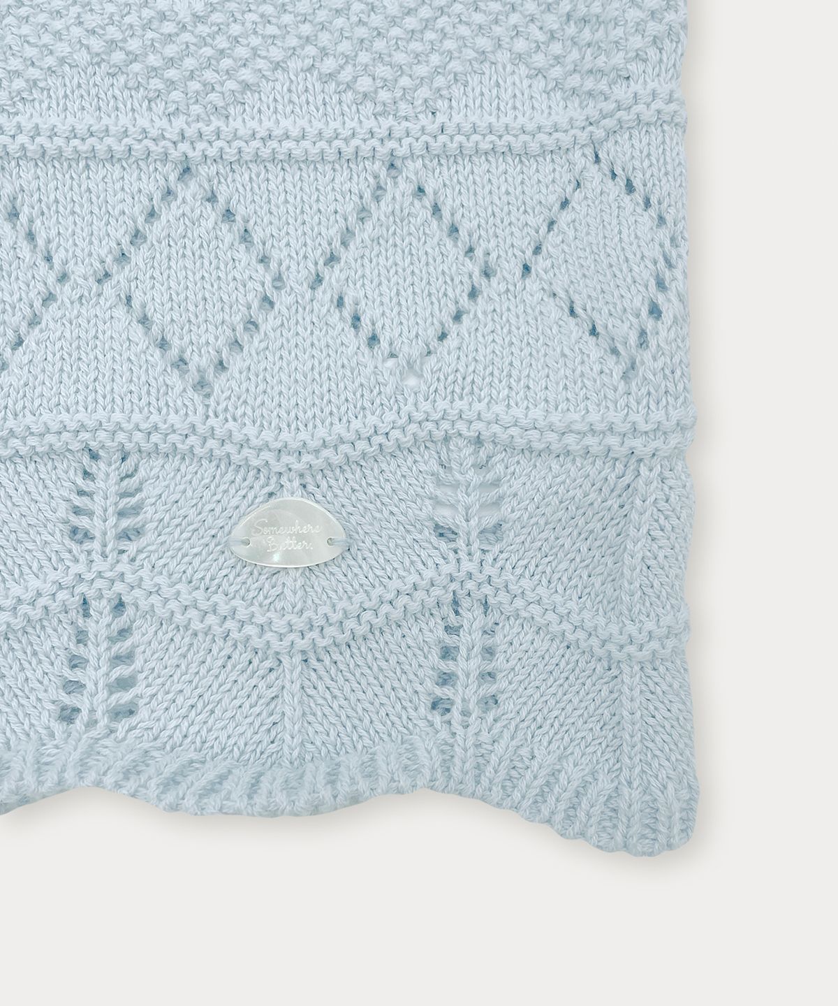 썸웨어버터(SOMEWHEREBUTTER) Plot Skashi Sleeveless Knit - Light Blue