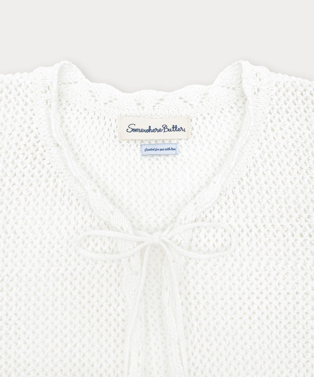 썸웨어버터(SOMEWHEREBUTTER) Beny Ribbon Cardigan - Ivory