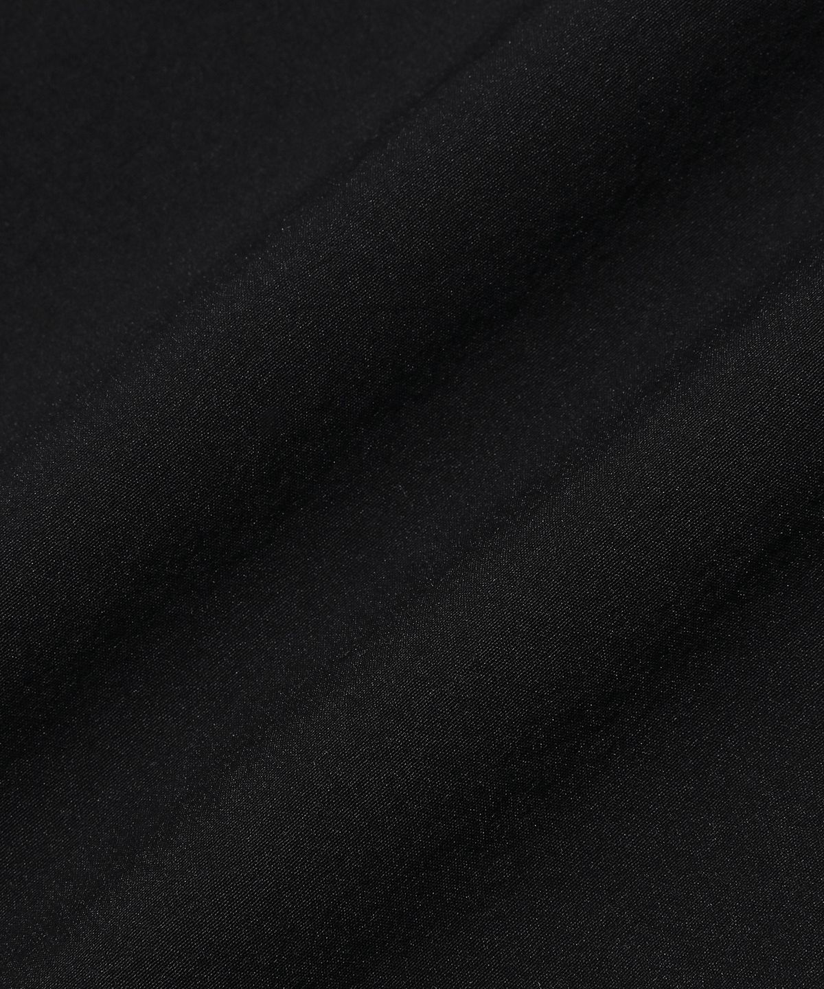 빈트릴(BEENTRILL) 스프레이 로고 우븐 아노락 점퍼(블랙)