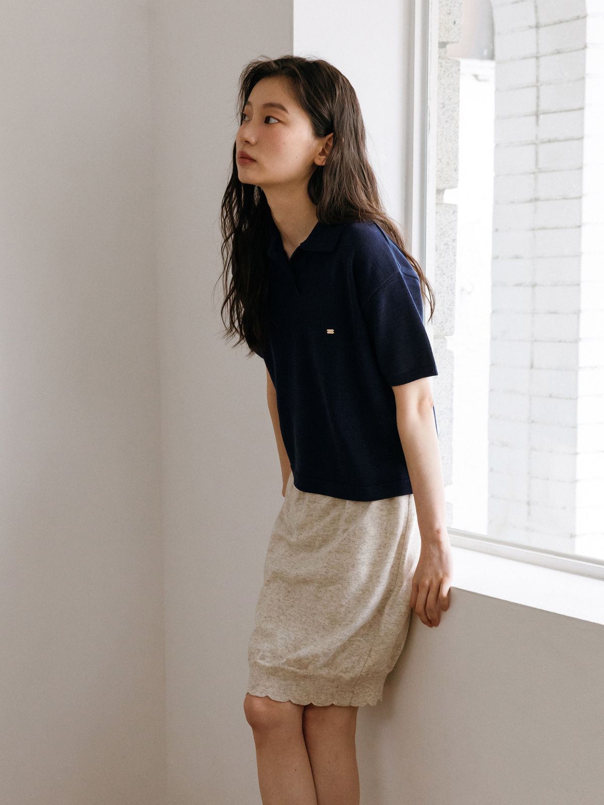 틴닛(TINKNIT) 프릴 헴 코튼 니트스커트_오트밀