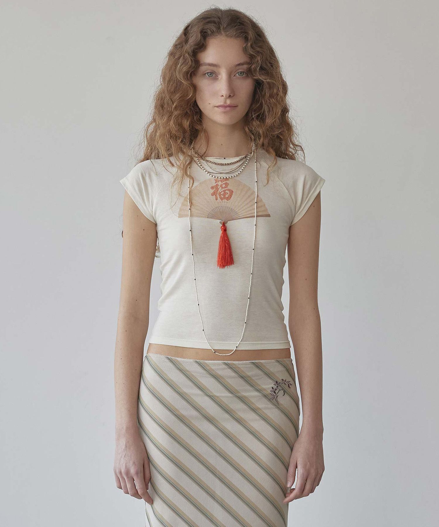 MUSINSA公式 | SCULPTOR Zen Tassel Tee Butter