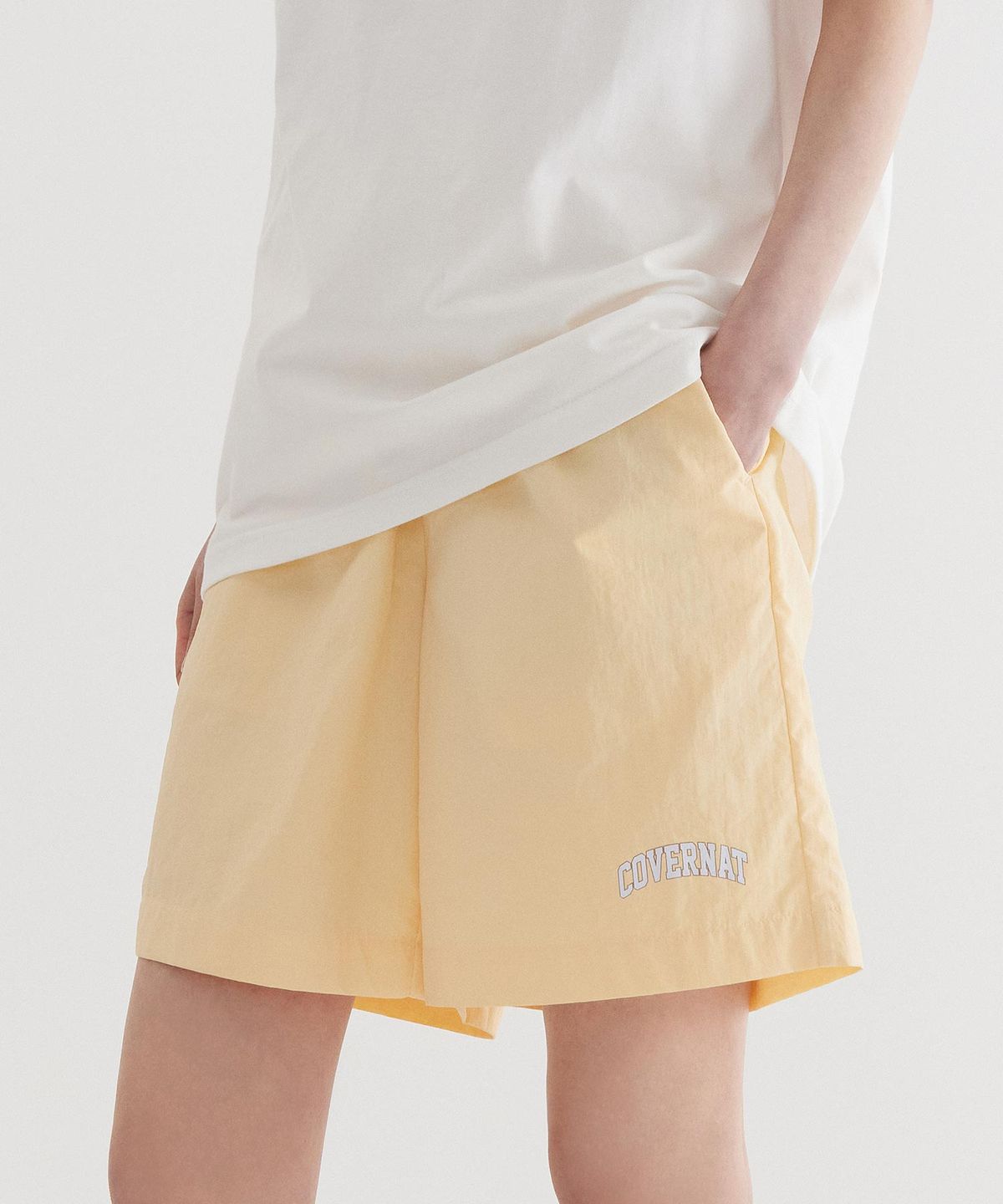 커버낫(COVERNAT) 레귤러 이지 나일론 쇼츠 Yellow