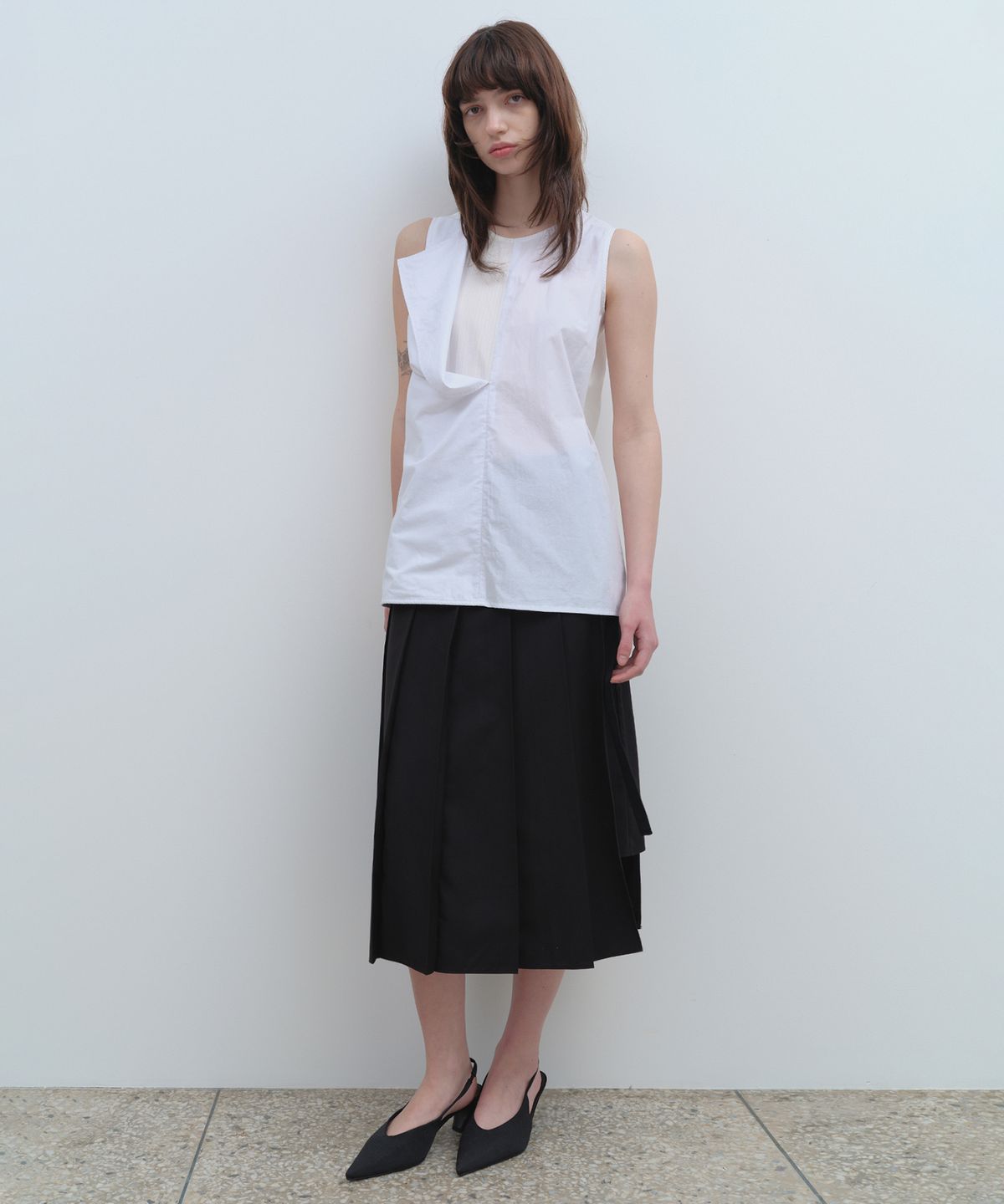 밀로 우먼(MILLO WOMEN) 지퍼 레이어 플리츠 스커트 [블랙]
