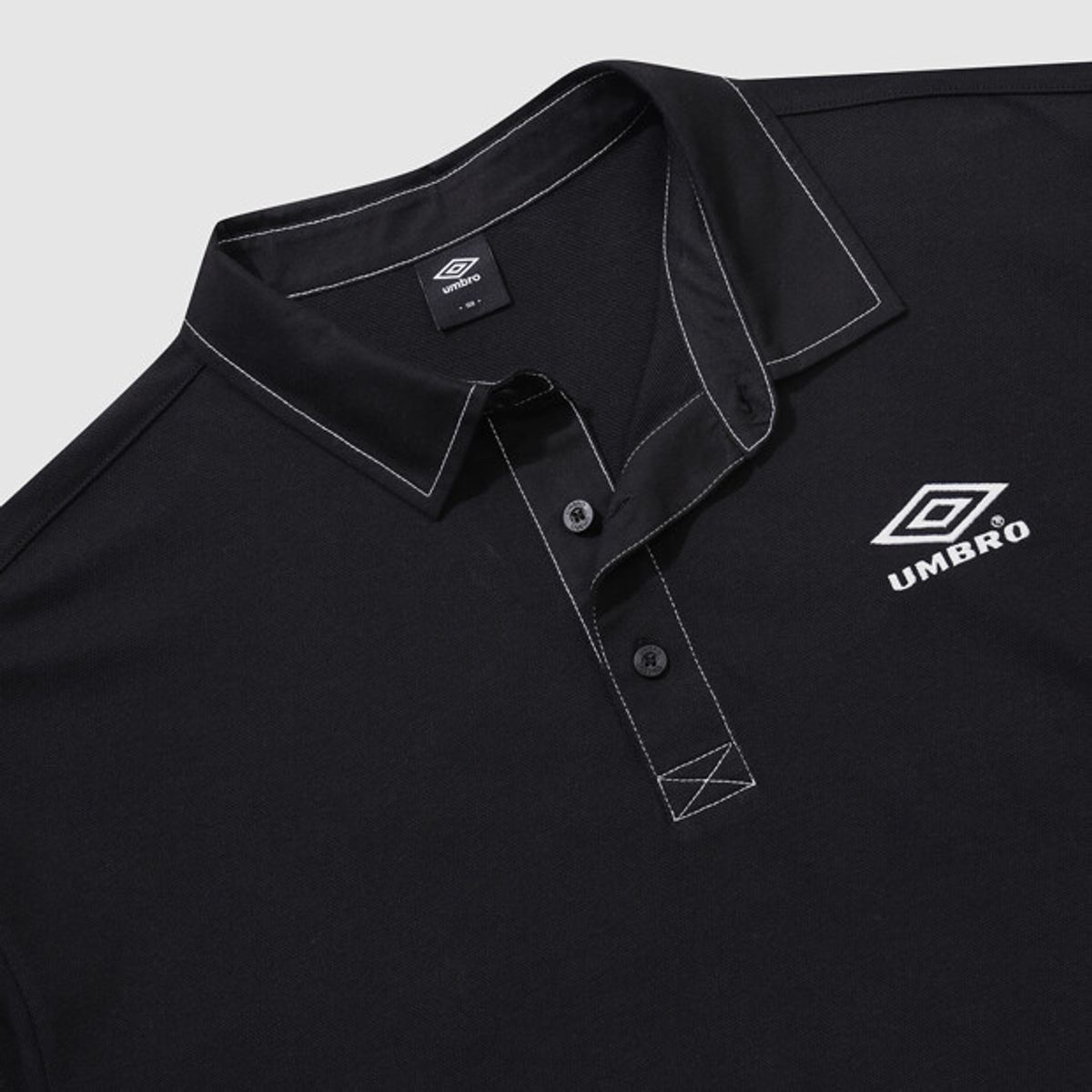 엄브로(UMBRO) 크리스피 타슬란 피케 카라 반팔 티셔츠 블랙(UQ223CTS59)