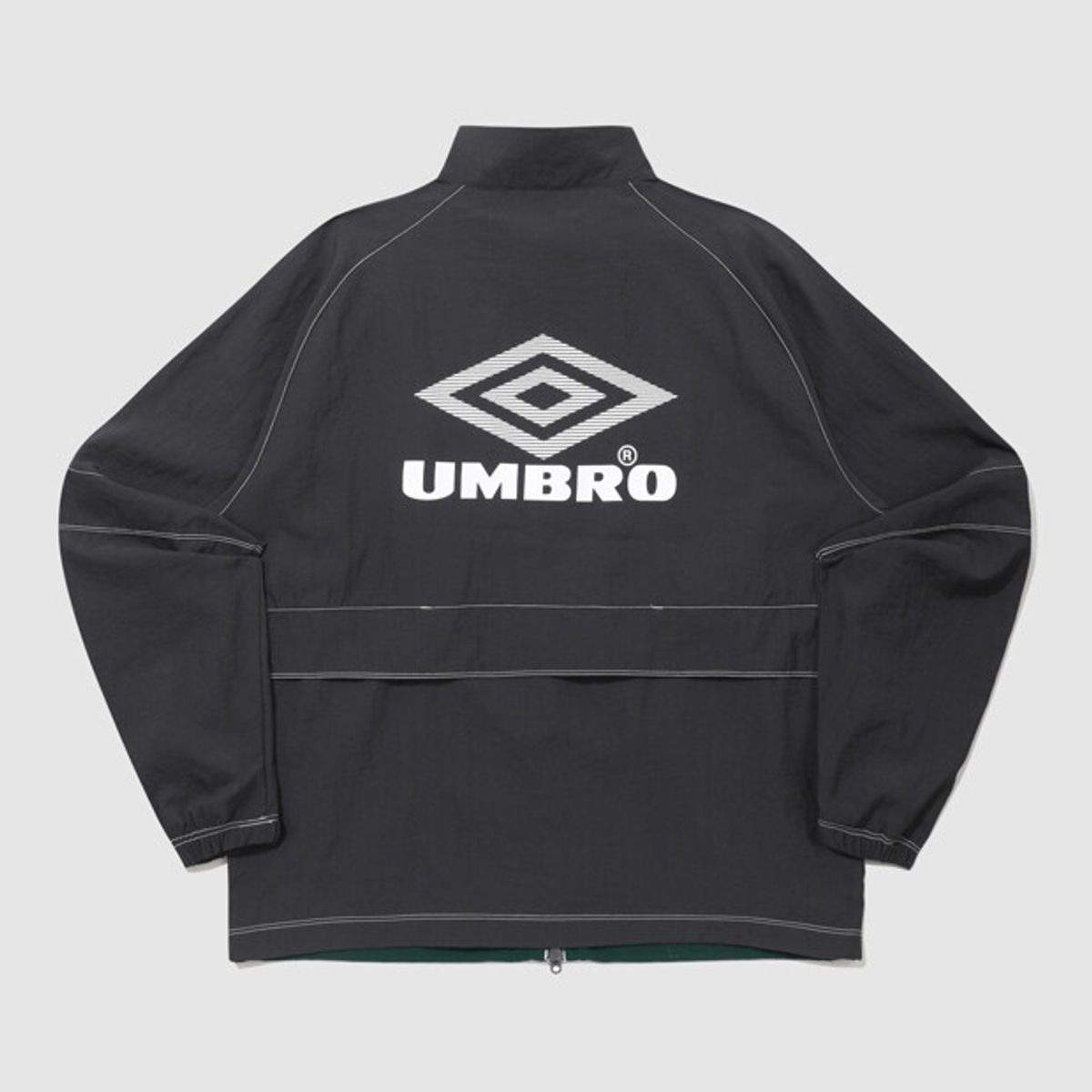 엄브로(UMBRO) 크리스피 타슬란 긴팔 바람막이 자켓 차콜(UQ221CJK57)