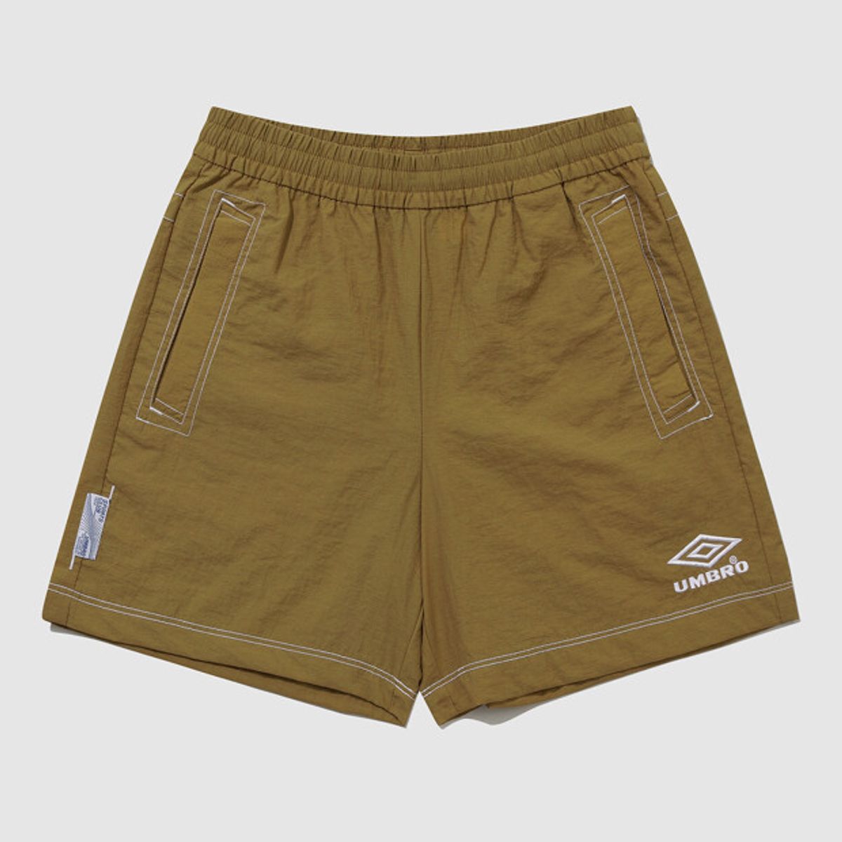 엄브로(UMBRO) 크리스피 타슬란 4.5부 반바지 카멜(UQ223CHP59)