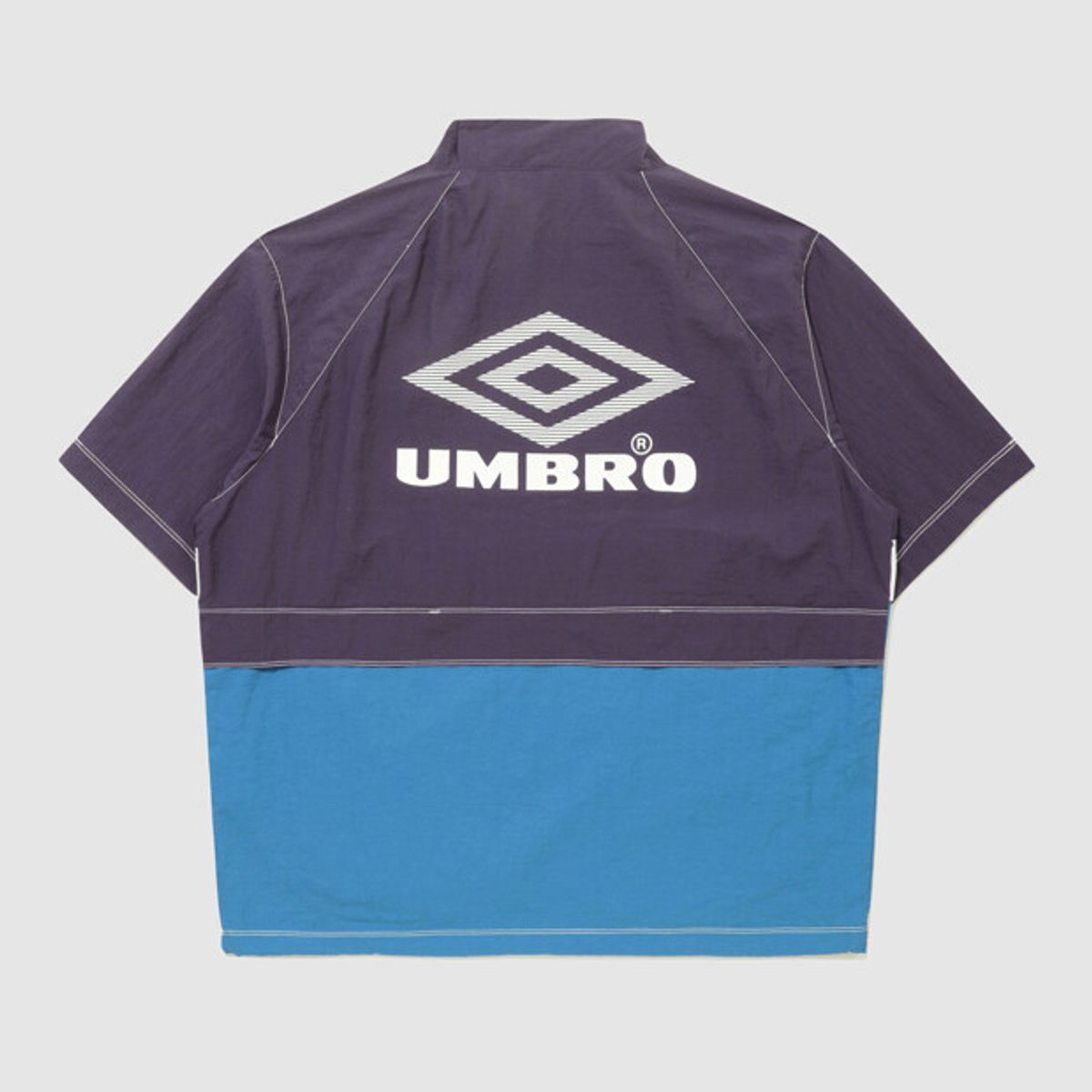 엄브로(UMBRO) 크리스피 타슬란 반팔 스탠넥 아노락 퍼플(UQ223CWT59)