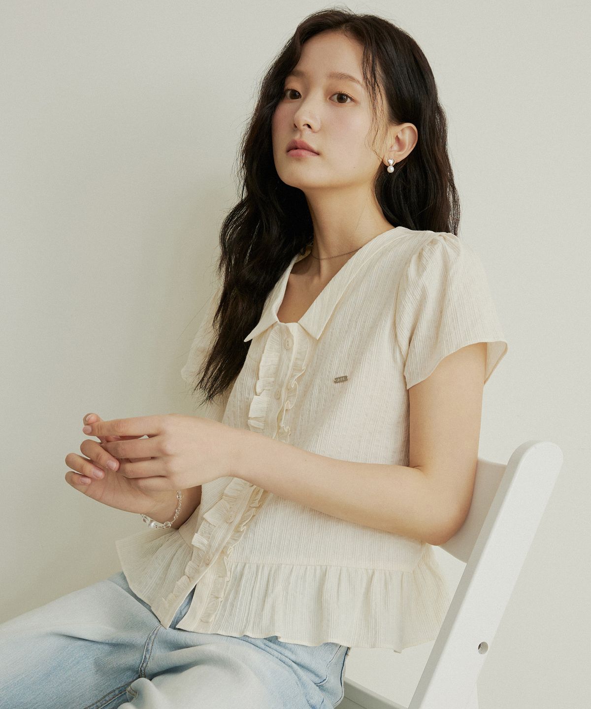 어다울(ADAUL) Frill jacquard cap sleeve blouse - cream