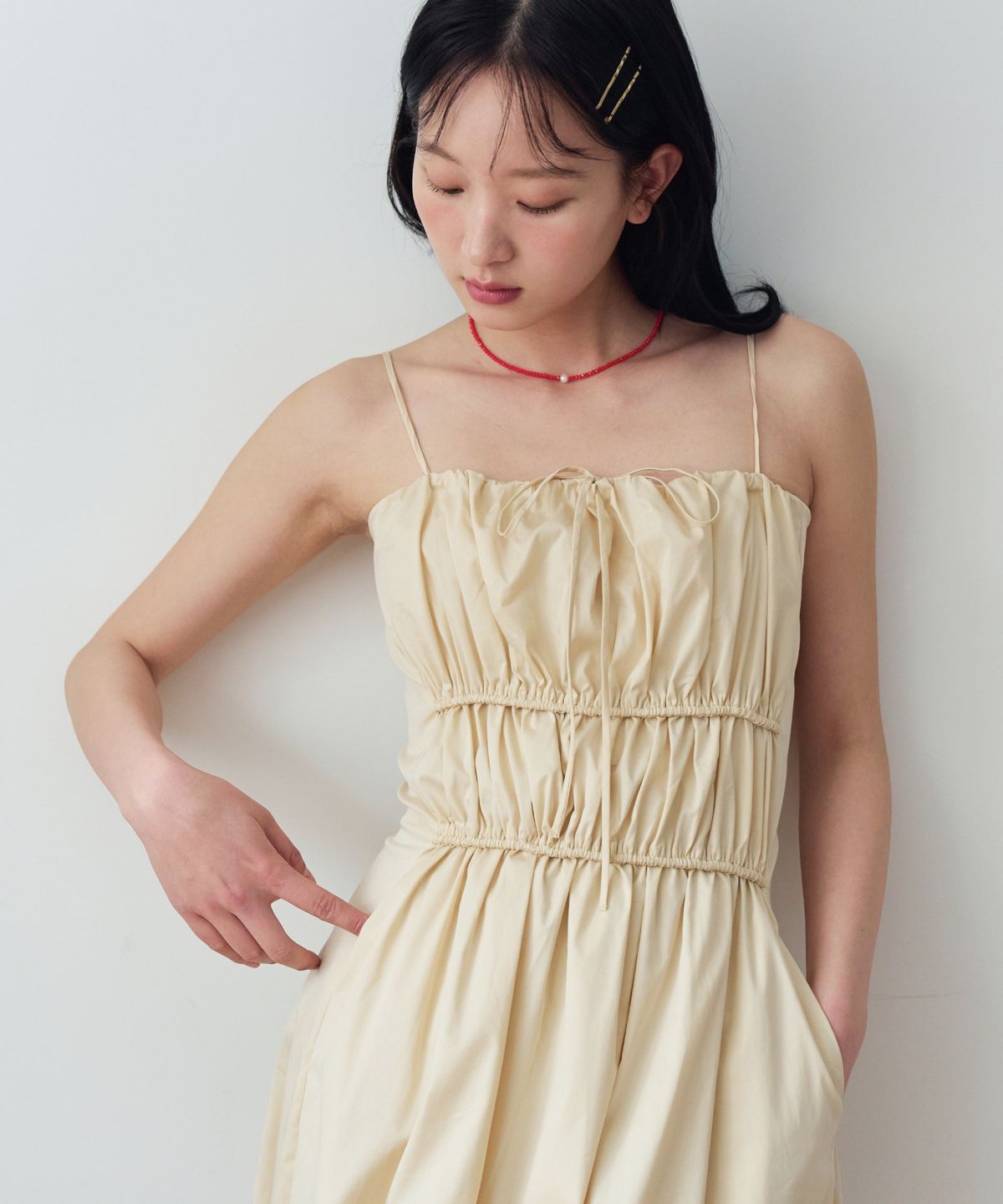 니주르(KNIZURE) 뷔스티에 셔링 롱 드레스_BUTTER YELLOW