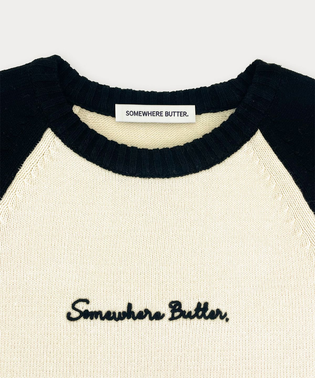 썸웨어버터(SOMEWHEREBUTTER) Casual Mini Letter Knit - Black