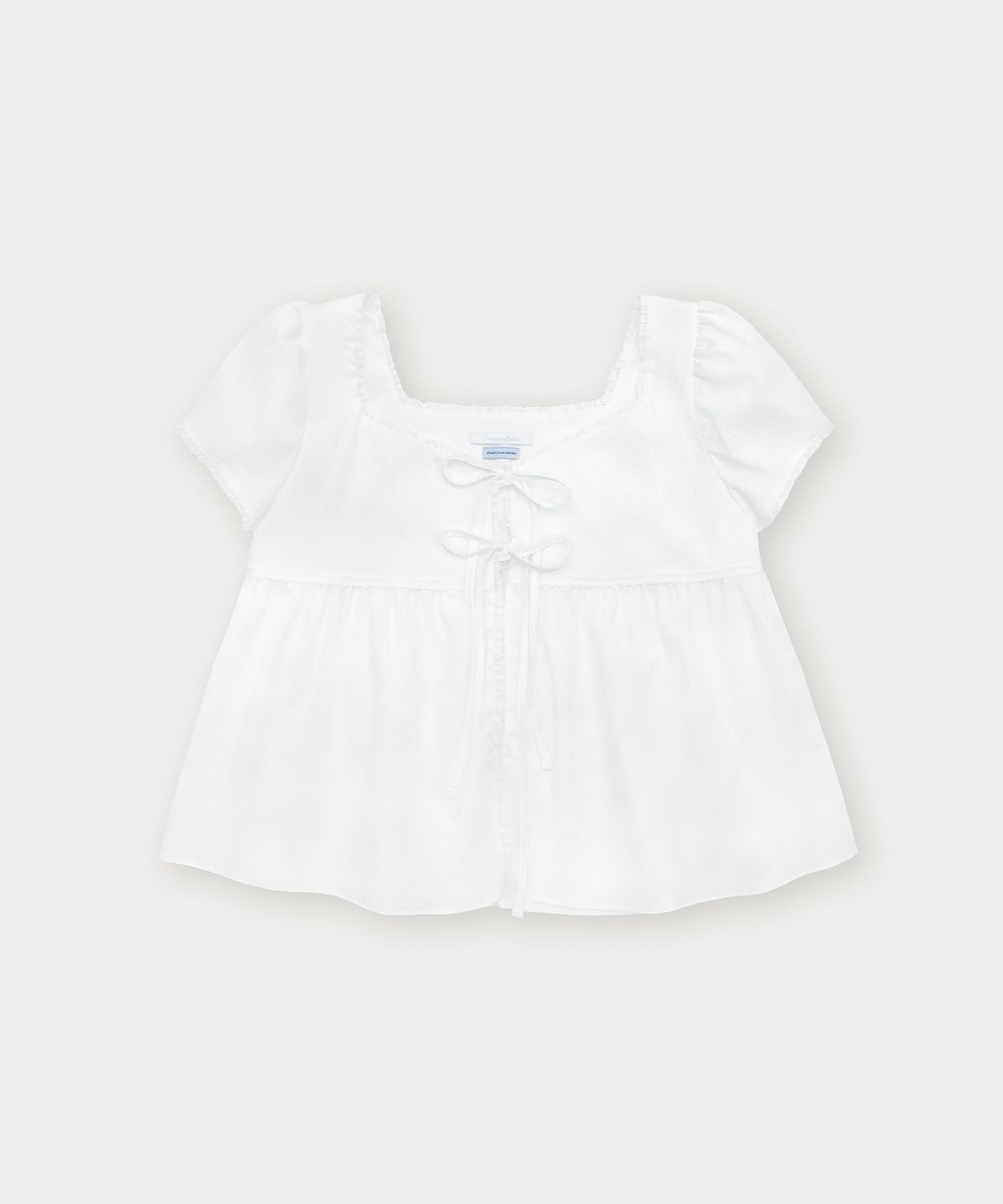 썸웨어버터(SOMEWHEREBUTTER) Sol Ribbon Blouse - Ivory