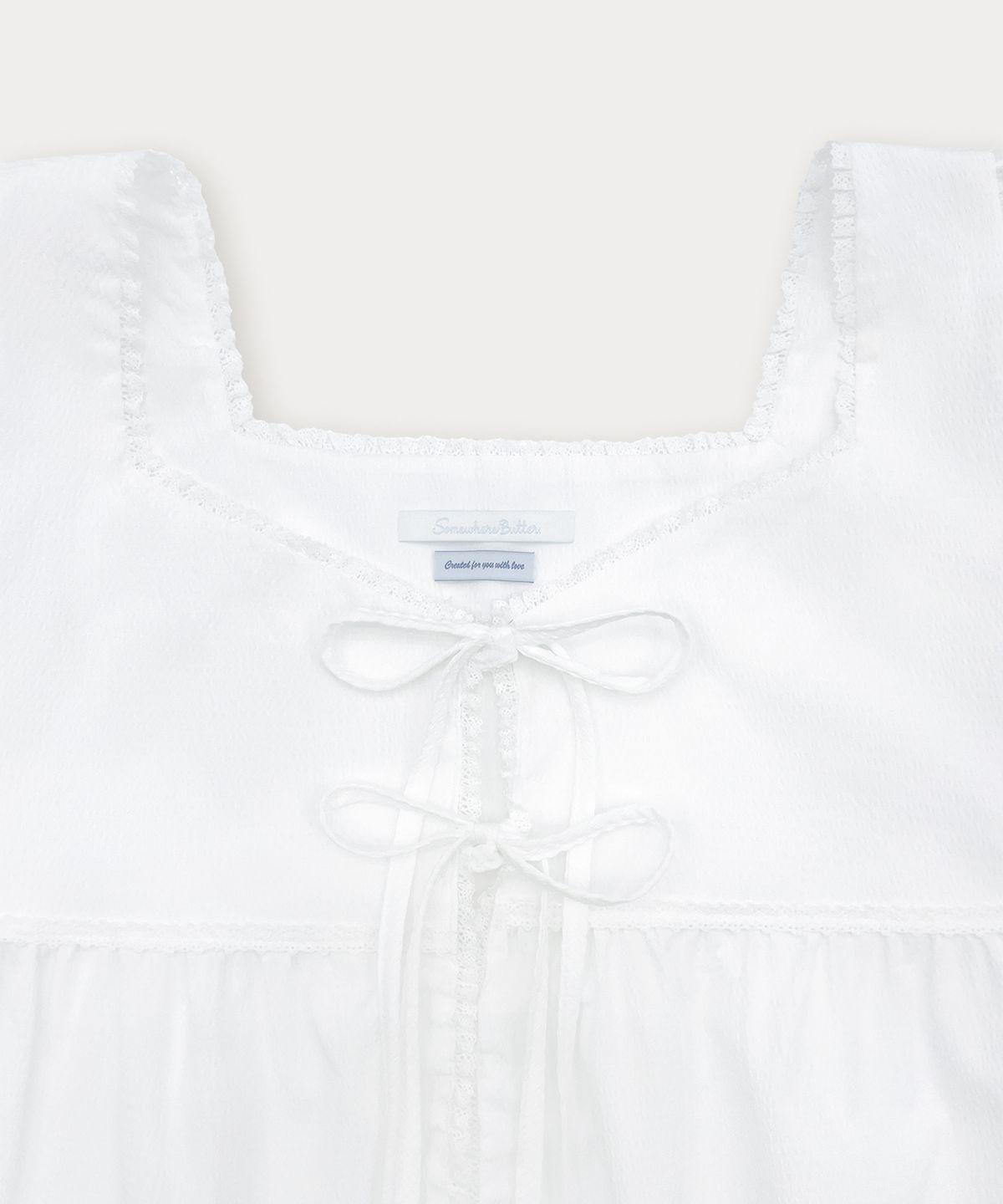 썸웨어버터(SOMEWHEREBUTTER) Sol Ribbon Blouse - Ivory