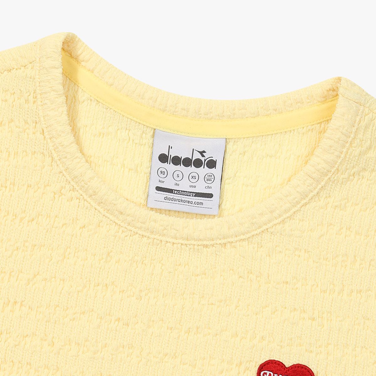 디아도라(diadora) 링클 베이직 반팔 티셔츠 YELLOW