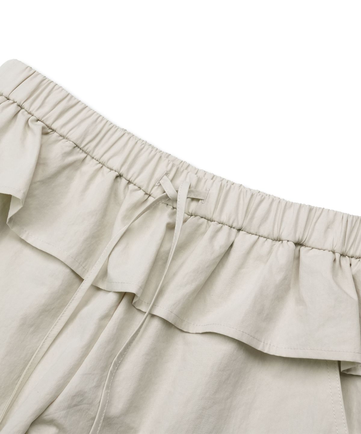도프셉(DOFFSEPT) Frill Edge Nylon Pants in Beige